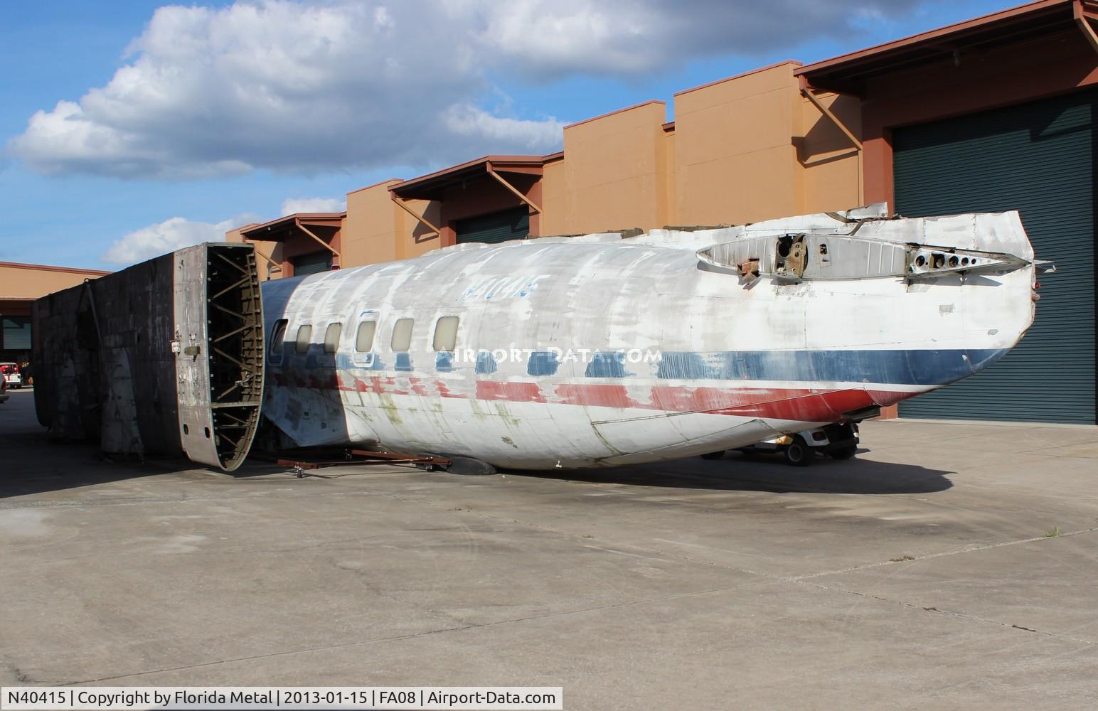 N40415, 1952 Martin 404 C/N 14119, Martin 404 fuselage in the back lots of Fantasy of Flight