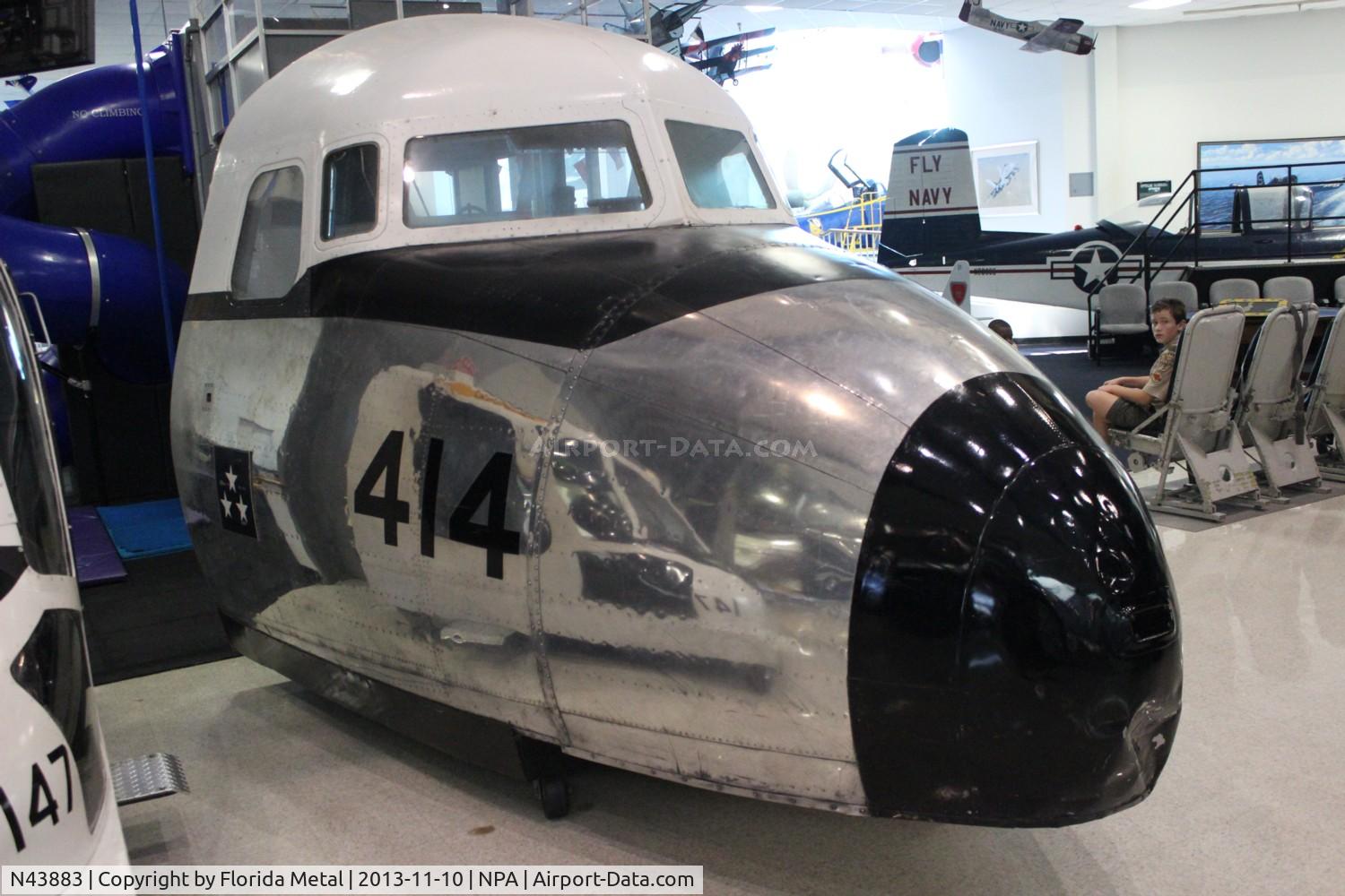 N43883, 1954 Douglas DC-6A C/N 44594, C-118 nose at Naval Aviation Museum