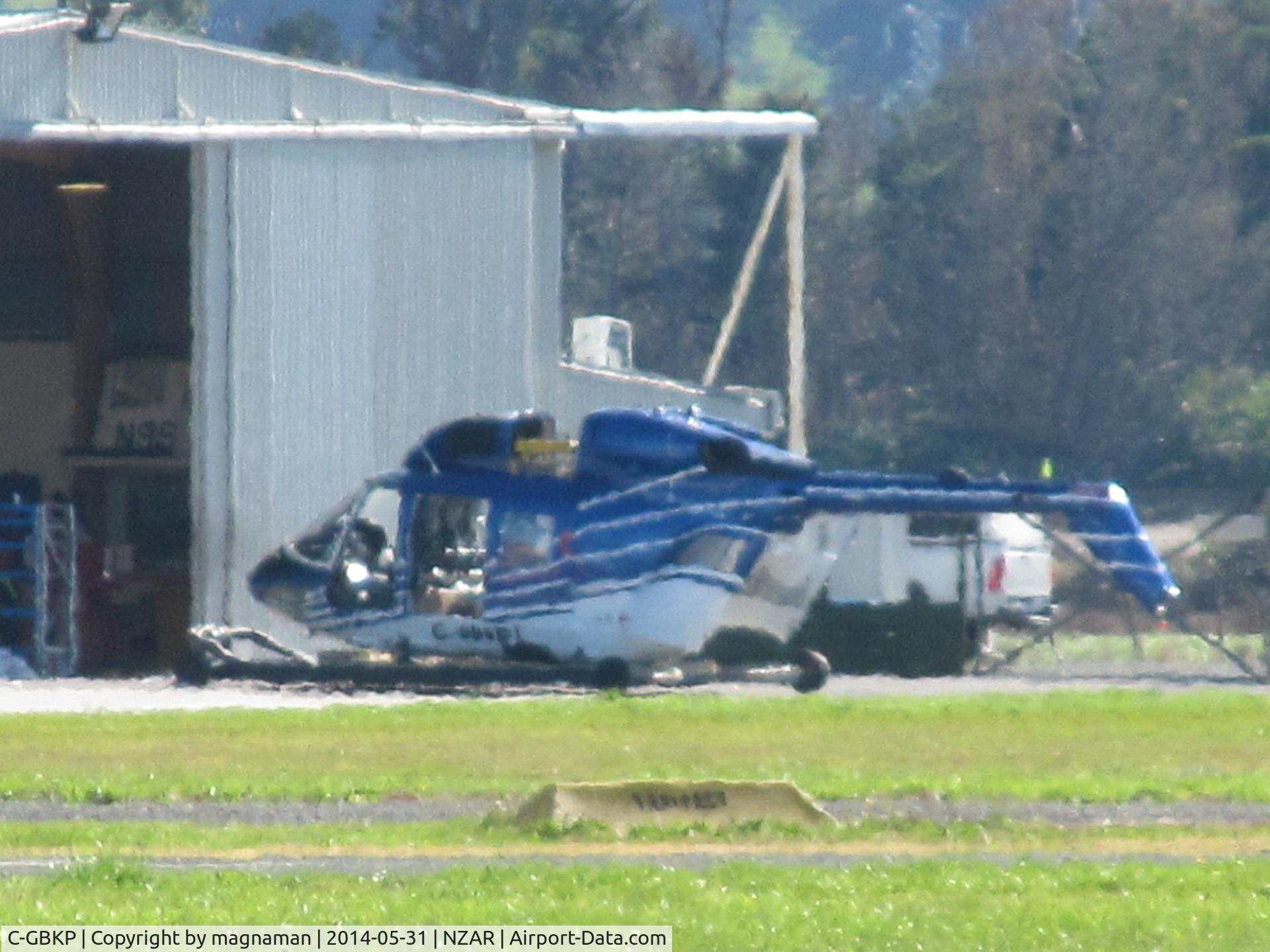 C-GBKP, 1990 Eurocopter-Kawasaki BK-117B-2 C/N 7213, No longer a PA 34 but newly imported (although still here in NZ at moment) BKK 117 c/n 7213 ex VH-BKZ then ZK-IIR until re-registered on 24 April 2014. Soory about the haze but I thought at time of photo it was still ZK-IIR!!