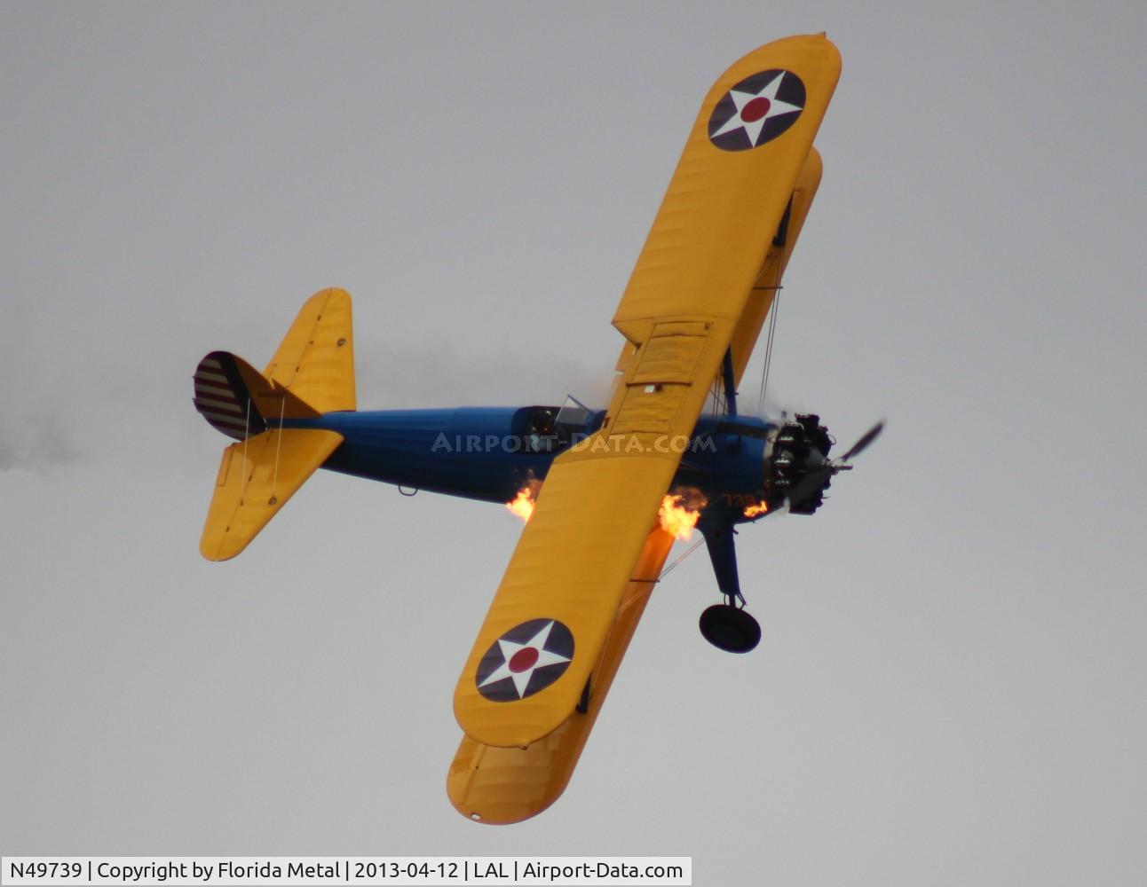 N49739, 1943 Boeing A75N1(PT17) C/N 75-4462, Nothing wrong with the plane, just part of the act.  John Mohr flies his Stearman upside down, the engine cuts and restarts shooting a flame out of the exhaust.