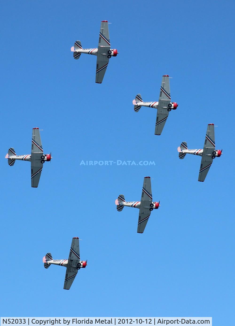 N52033, 1946 North American SNJ-2 Texan C/N 2040, Geico Skytypers SNJ-2 over Daytona Beach