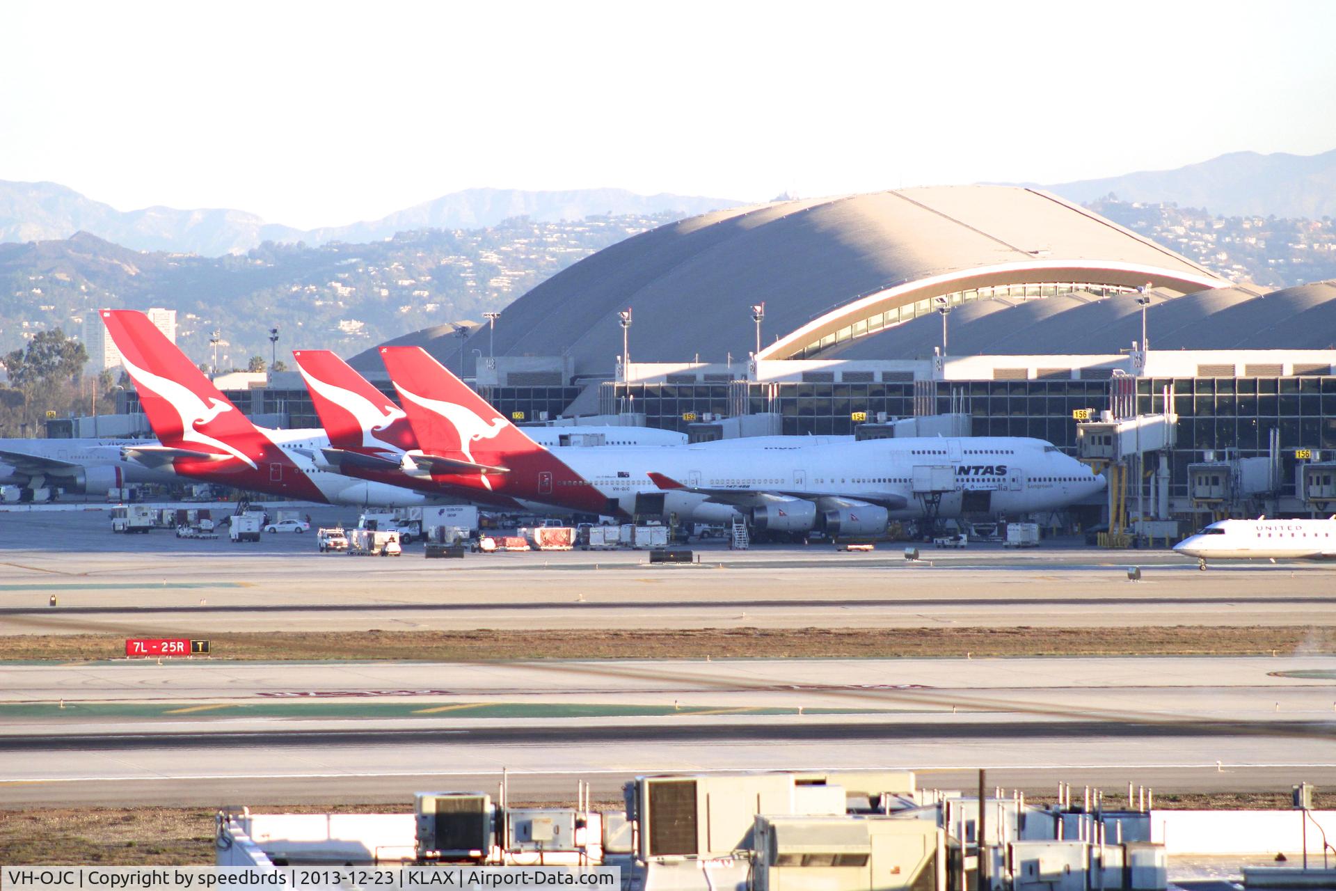 VH-OJC, 1989 Boeing 747-438 C/N 24406, Qantas threesome at LAX TBIT.