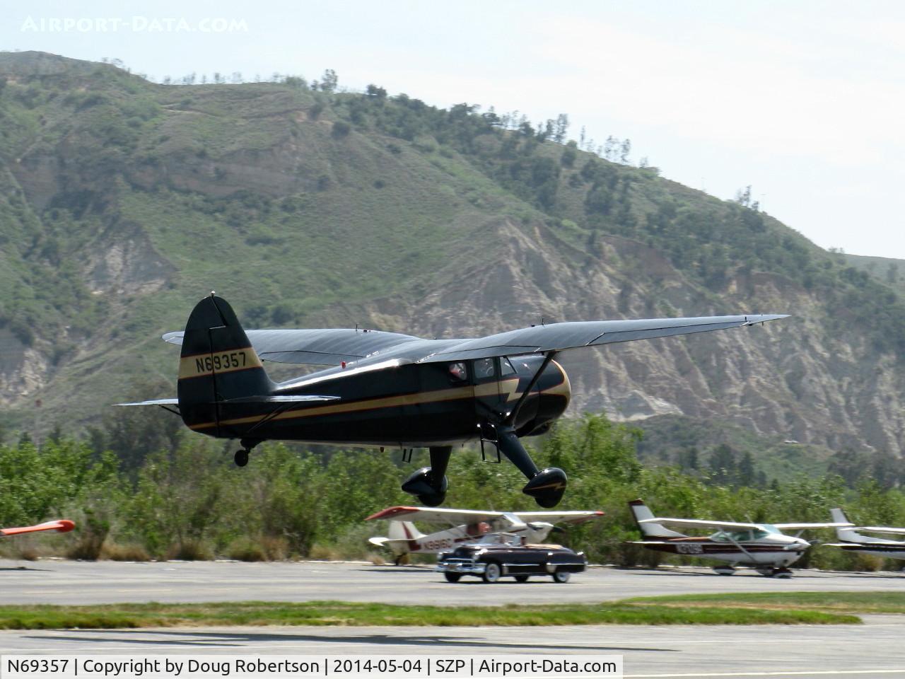 N69357, 1944 Stinson V77 Reliant C/N 77-448, 1944 Stinson V-77 by Vultee Aviation, Lycoming R-680-13 per engine data plate, 9 cylinder 300 Hp radial, gull-winged beauty on takeoff climb Rwy 22
