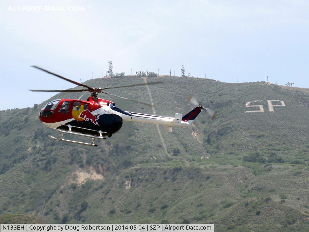 N133EH, 1982 MBB Bo-105CBS-4 C/N S-598, 1982 Messerschmitt-Bolkow-Blohm Gmbh BO105 CBS4 of RED BULL, 2 Rolls Royce Allison 250 C20 Turboshafts 420 shp ea. Modified-Only helo approved by FAA for unlimited aerobatics (except outside loops) Experimental class, departure climb.