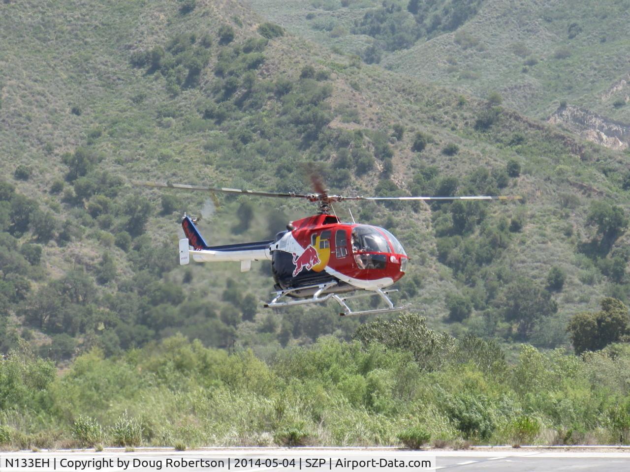 N133EH, 1982 MBB Bo-105CBS-4 C/N S-598, 1982 Messerschmitt-Bolkow-Blohm Gmbh BO105 CBS4 of RED BULL, 2 Rolls Royce Allison 250 C20 Turboshafts 420 shp ea. Modified, Only helo approved by FAA for unlimited aerobatics (except outside loops). liftoff SZP helipad