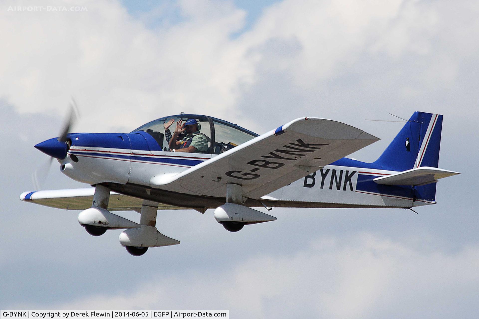 G-BYNK, 1999 Robin HR-200-160 C/N 338, Seen pulling out from runway 22 at EGFP en-route to Bodmin.