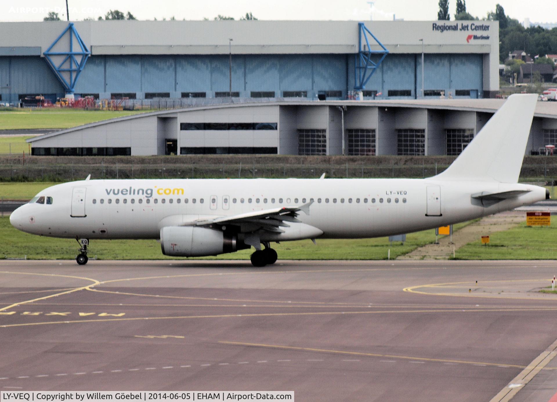 LY-VEQ, 1997 Airbus A320-232 C/N 709, taxi to runway L18 of Schiphol Airport for take off