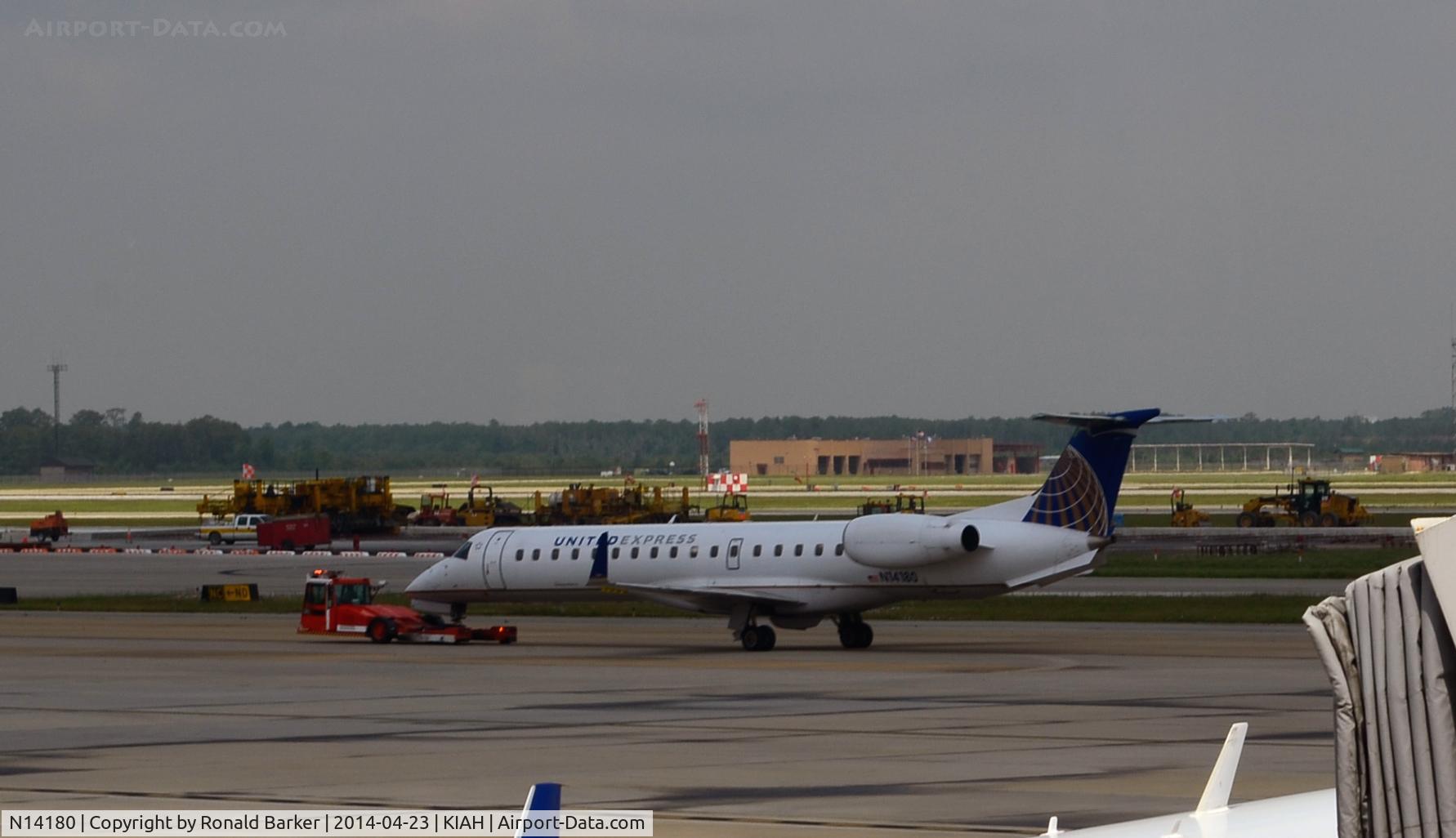 N14180, 2005 Embraer ERJ-145XR (EMB-145XR) C/N 14500900, Towed Houston