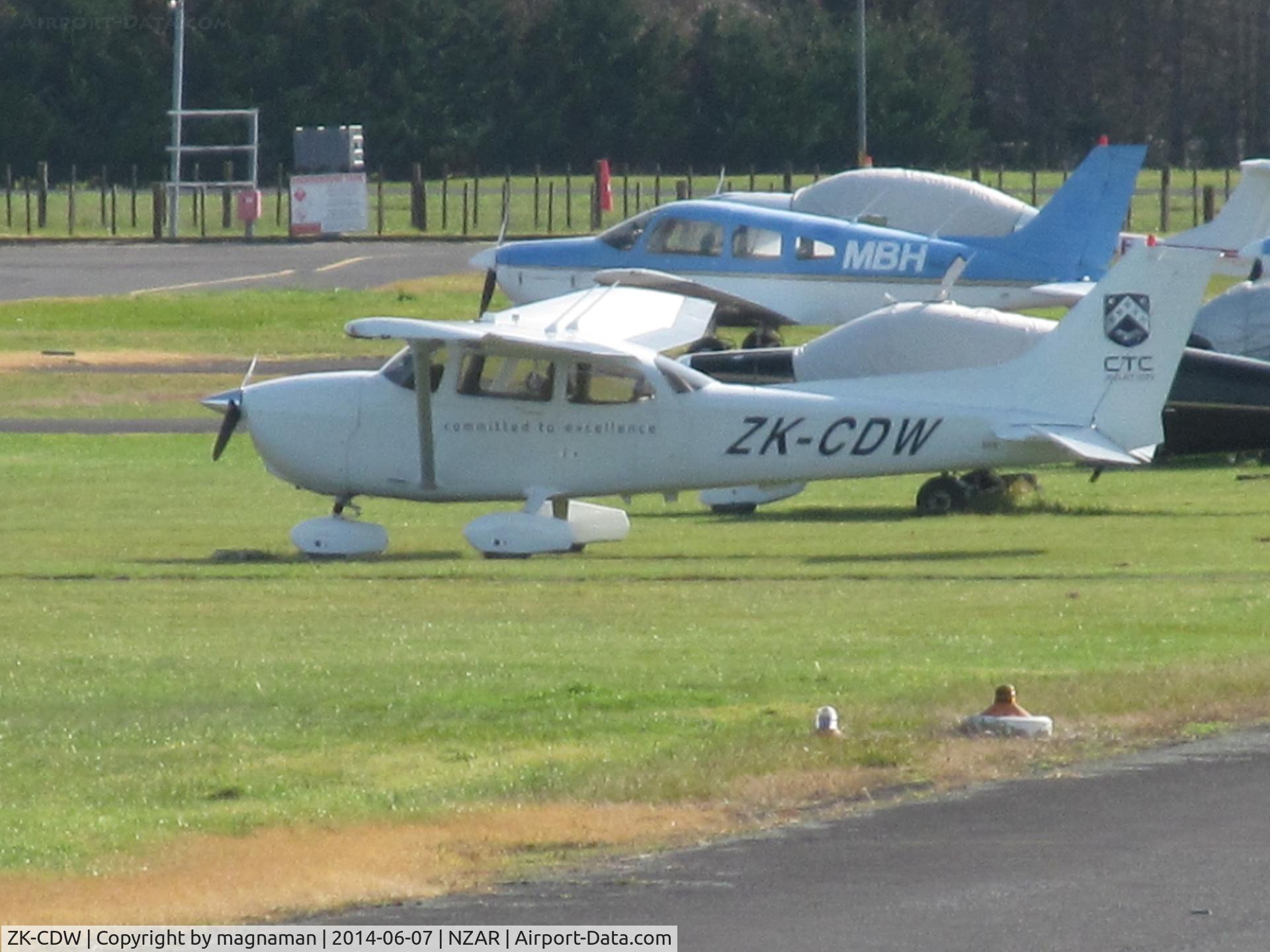 ZK-CDW, 2005 Cessna 172S C/N 172S9935, on grass at Ardmore - new to me