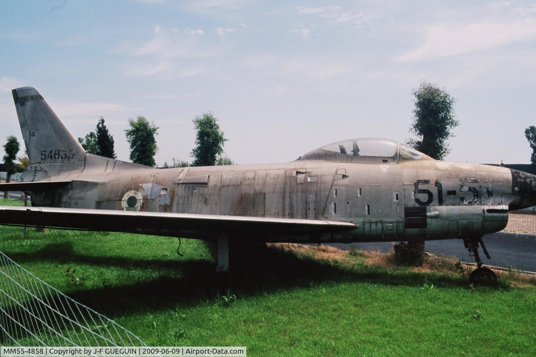 MM55-4858, North American (Fiat) F-86K Sabre C/N 221-98, MM55-4858 (c/n 221-98) on display in Parco Ditellandia, Castel Volturno, Italy, with tail of MM55-4869 (c/n 221-109).