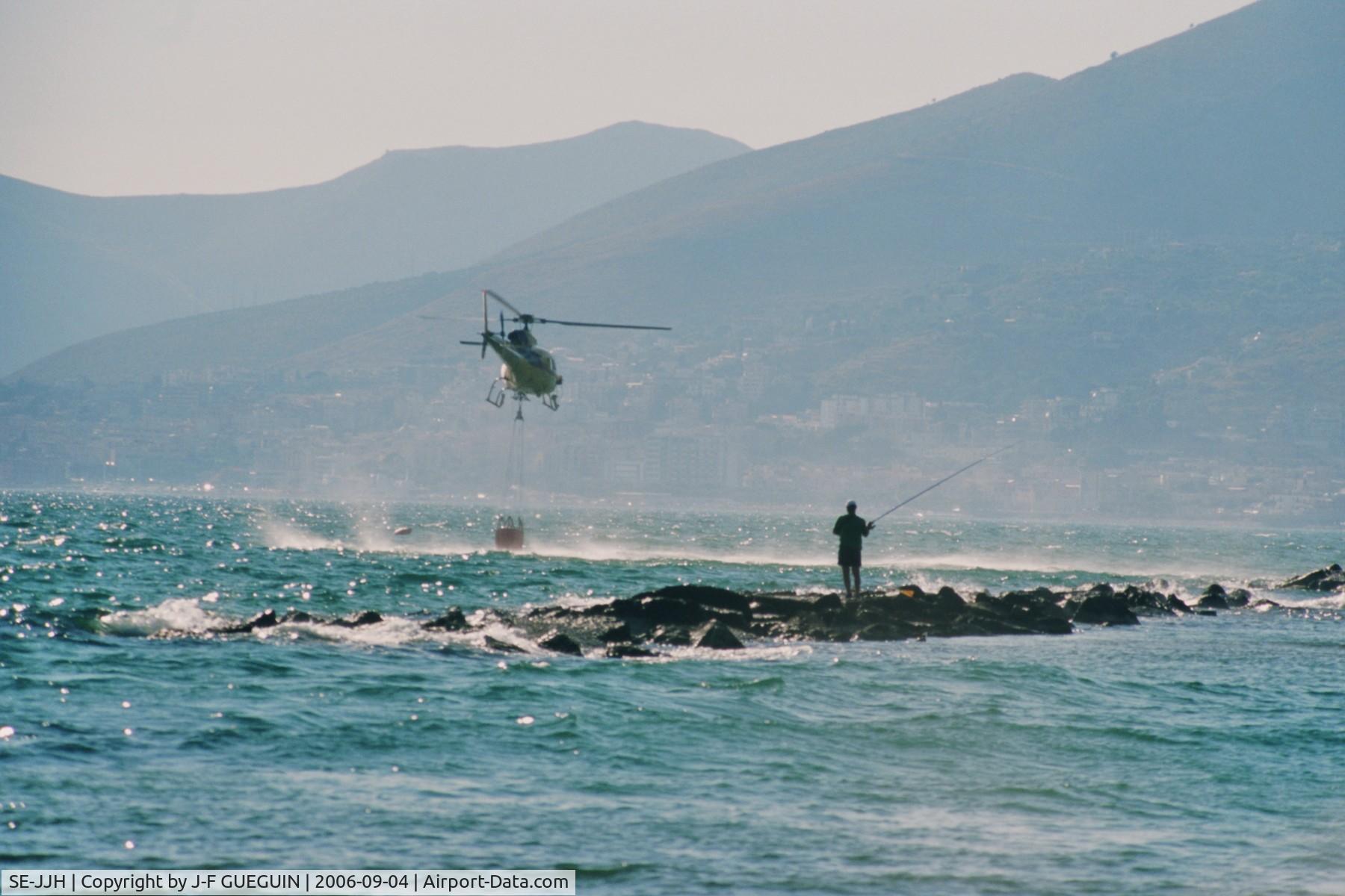SE-JJH, Eurocopter AS-350B-3+ Ecureuil Ecureuil C/N 4072, SE-JJH while refilling in front of Formia (Italy).