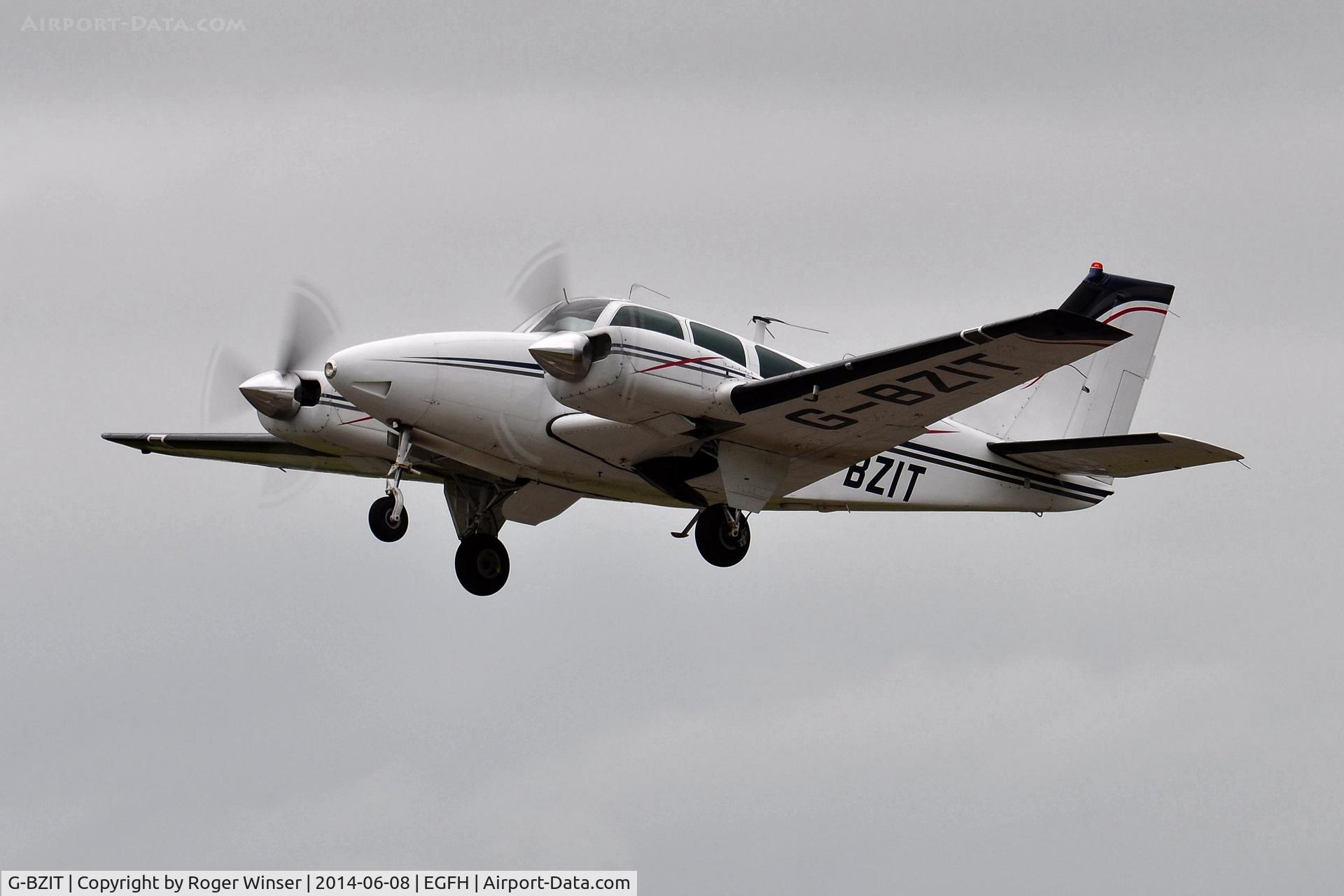 G-BZIT, 1964 Beech 95-B55 Baron Baron C/N TC-564, Visiting Beech Baron operated by Propellerhead Aviation departing Runway 22. Previously registered HB-GBS.