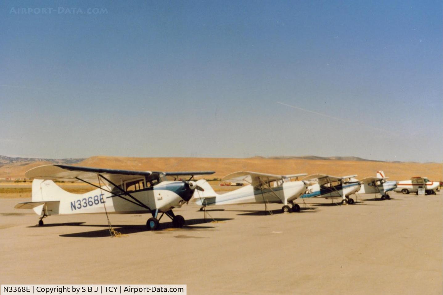 N3368E, 1947 Aeronca 11BC Chief C/N 11BC-1704, 68E on taildragger row at the Tracy airport in 1987.