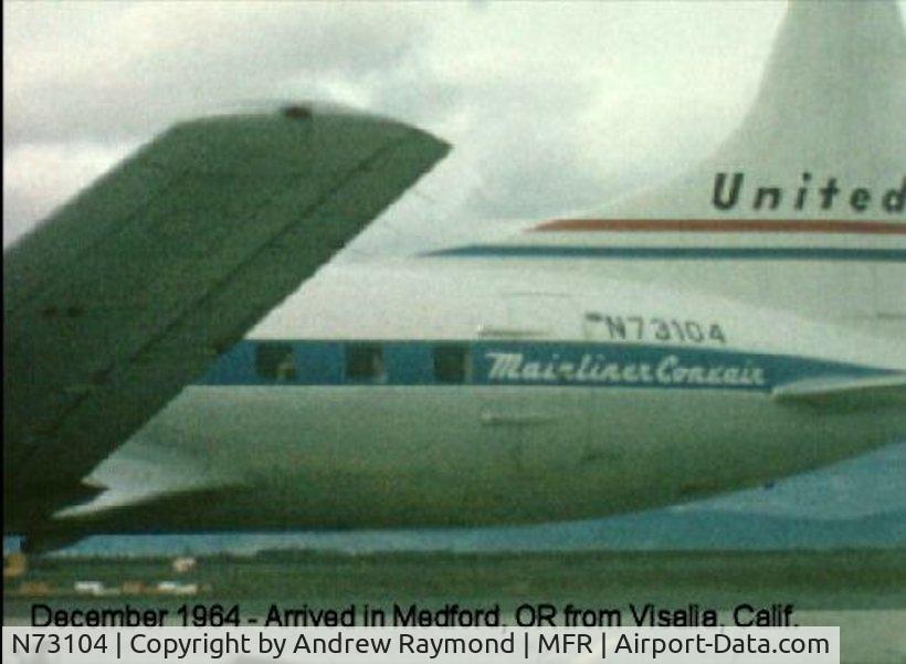N73104, 1952 Convair 340-31 C/N 4, Andy Raymond arriving in Medford, Oregon on a flight from Visalia, California in December 1964. United Airlines Convair CV-340 Tail Number N73104 Serial # 4 - N73104 - Delivered as Convair 340 to United in May 1952. Converted to a CV 580 in Dec 1968