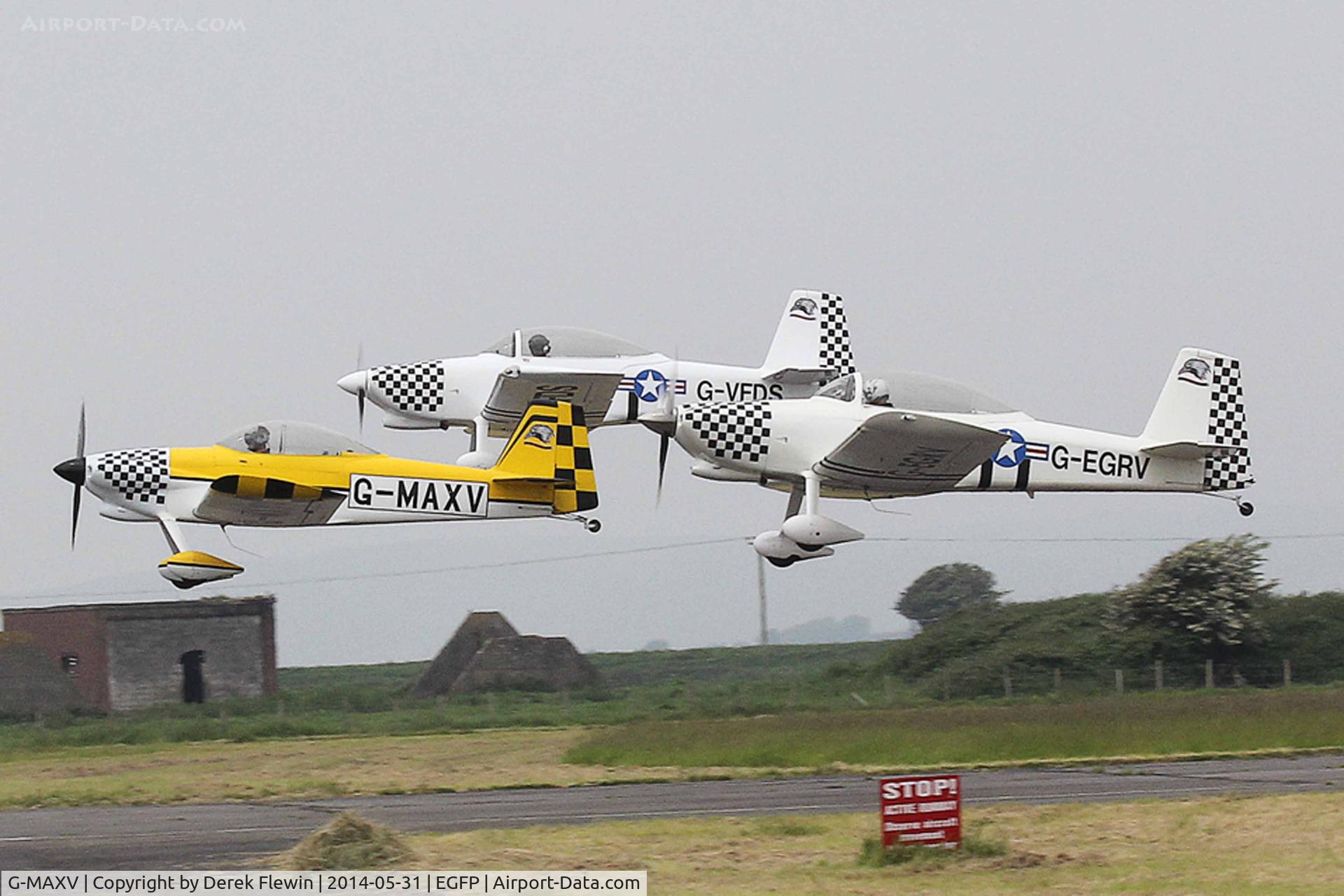 G-MAXV, 2000 Vans RV-4 C/N PFA 181-13266, G-MAXV leading, G-VFDS and G-EGRV, pulling out from runway 22 at EGFP.