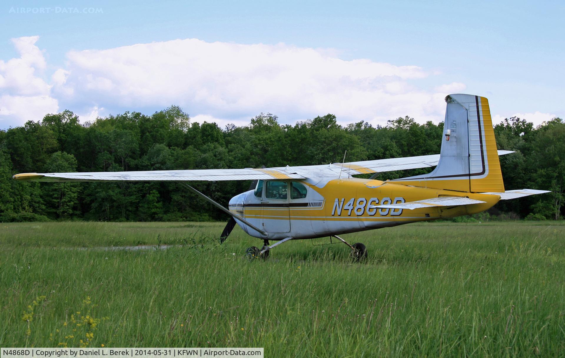 N4868D, 1958 Cessna 182A Skylane C/N 34968, No, this photo is not askew; that is the angle of this 1958 aircraft, as I saw her at Sussex Airport, NJ.  Tires were flat, as well.  I last spotted this aircraft seven years ago in Kutztown, PA; she looked a lot healthier then.