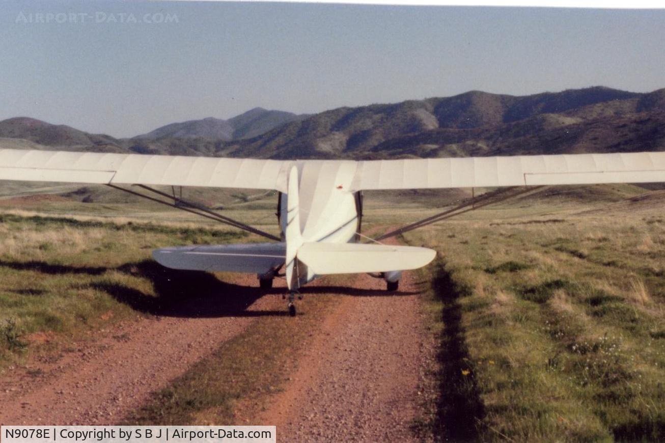 N9078E, 1946 Aeronca 11AC Chief C/N 11AC-710, The advantage of a tailwheel. 78E in central Calif. in 2001. This area has a lot of roads like this that can be safely landed on.This is why tailwheels are so neat!