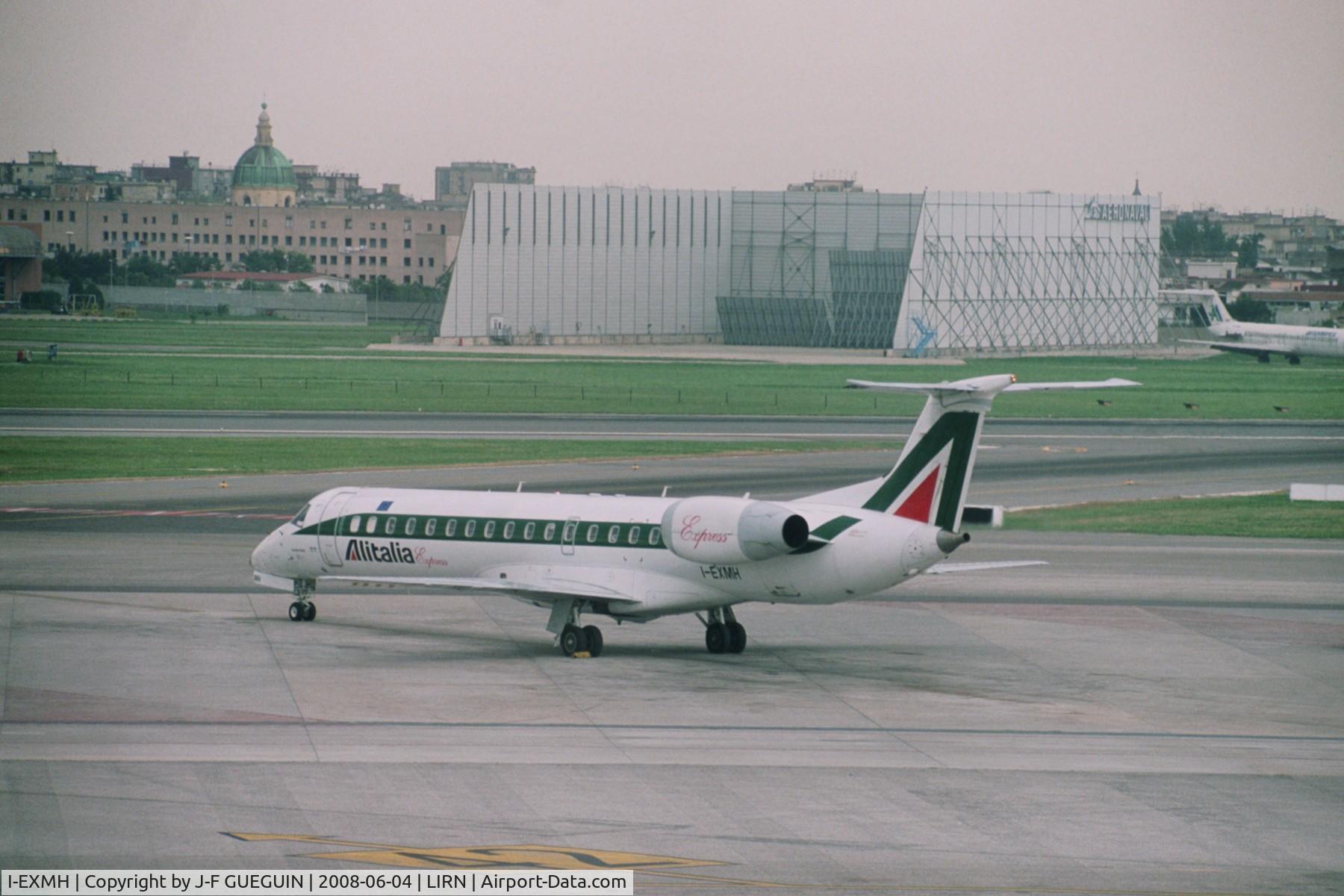I-EXMH, 2002 Embraer ERJ-145LR (EMB-145LR) C/N 145665, I-EXMH waiting at Naples-Capodichino.