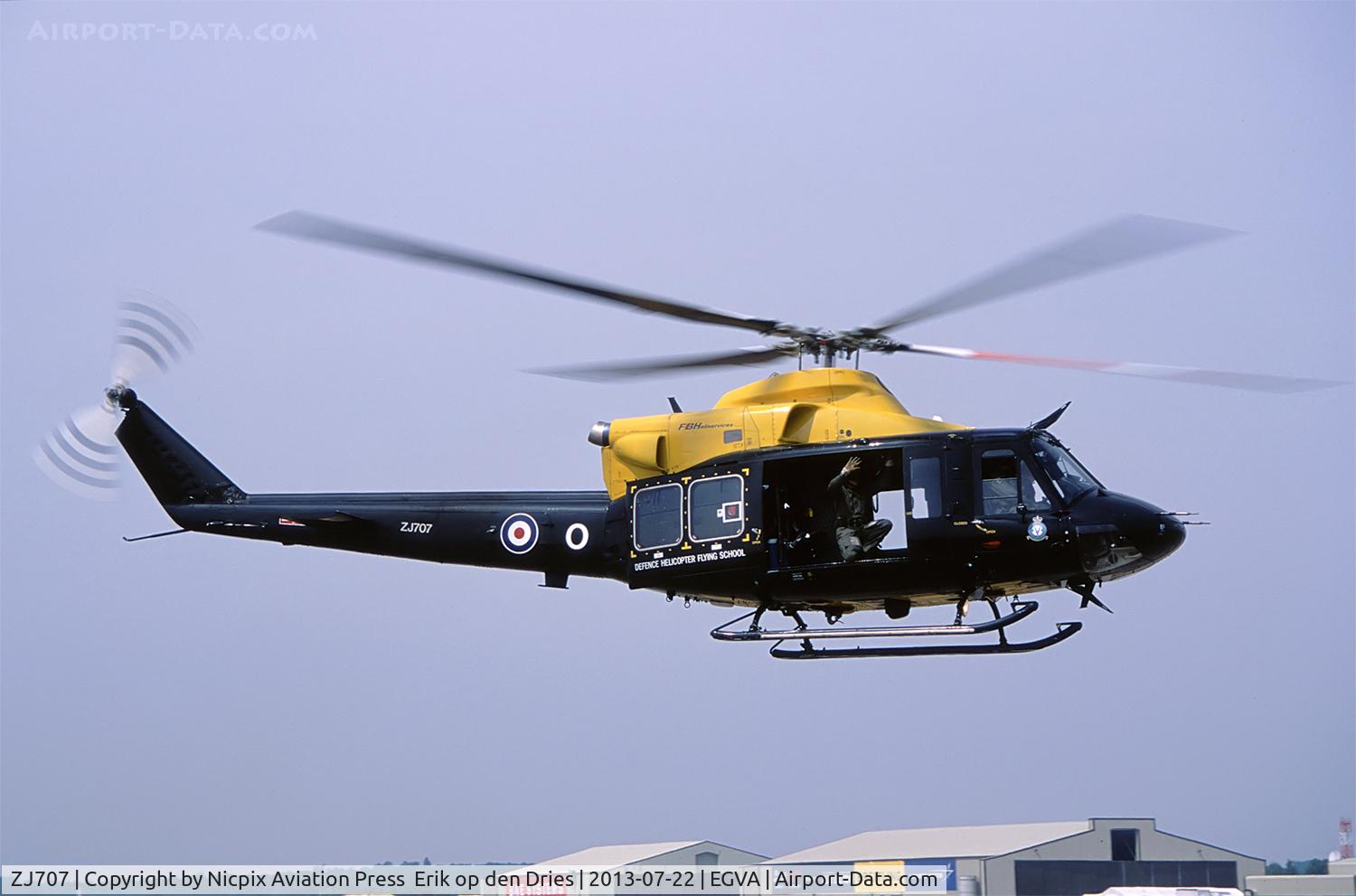 ZJ707, 2002 Bell 412EP Griffin HT1 C/N 36297, ZJ707 seen hovering over the taxitrack at RAF Fairford