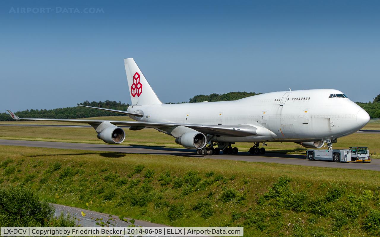 LX-DCV, 1990 Boeing 747-4B5F/SCD C/N 24619, towed to the parking area