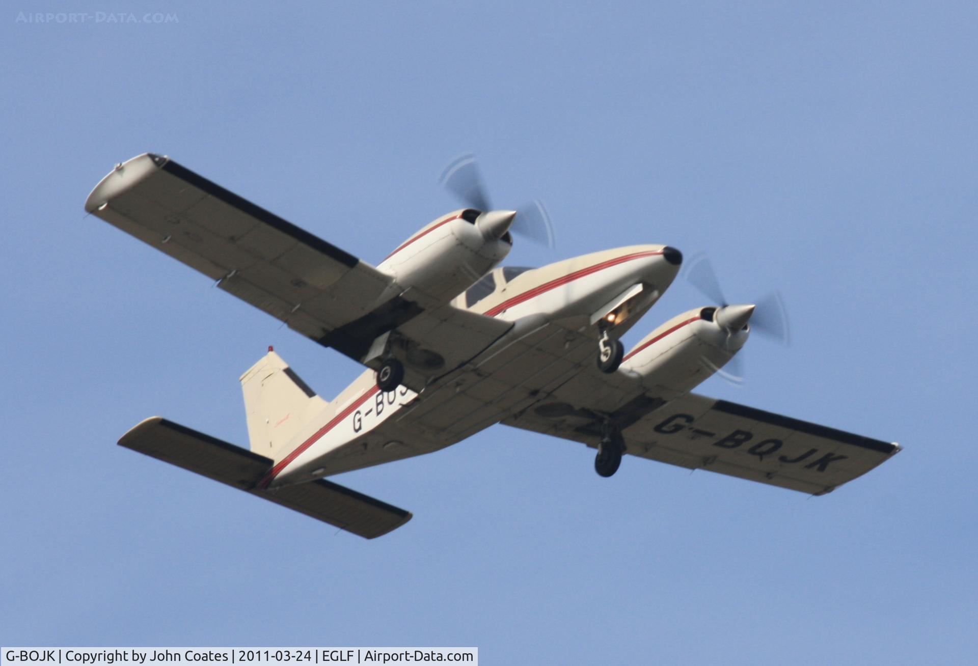 G-BOJK, 1986 Piper PA-34-220T Seneca III C/N 34-33020, Low pass