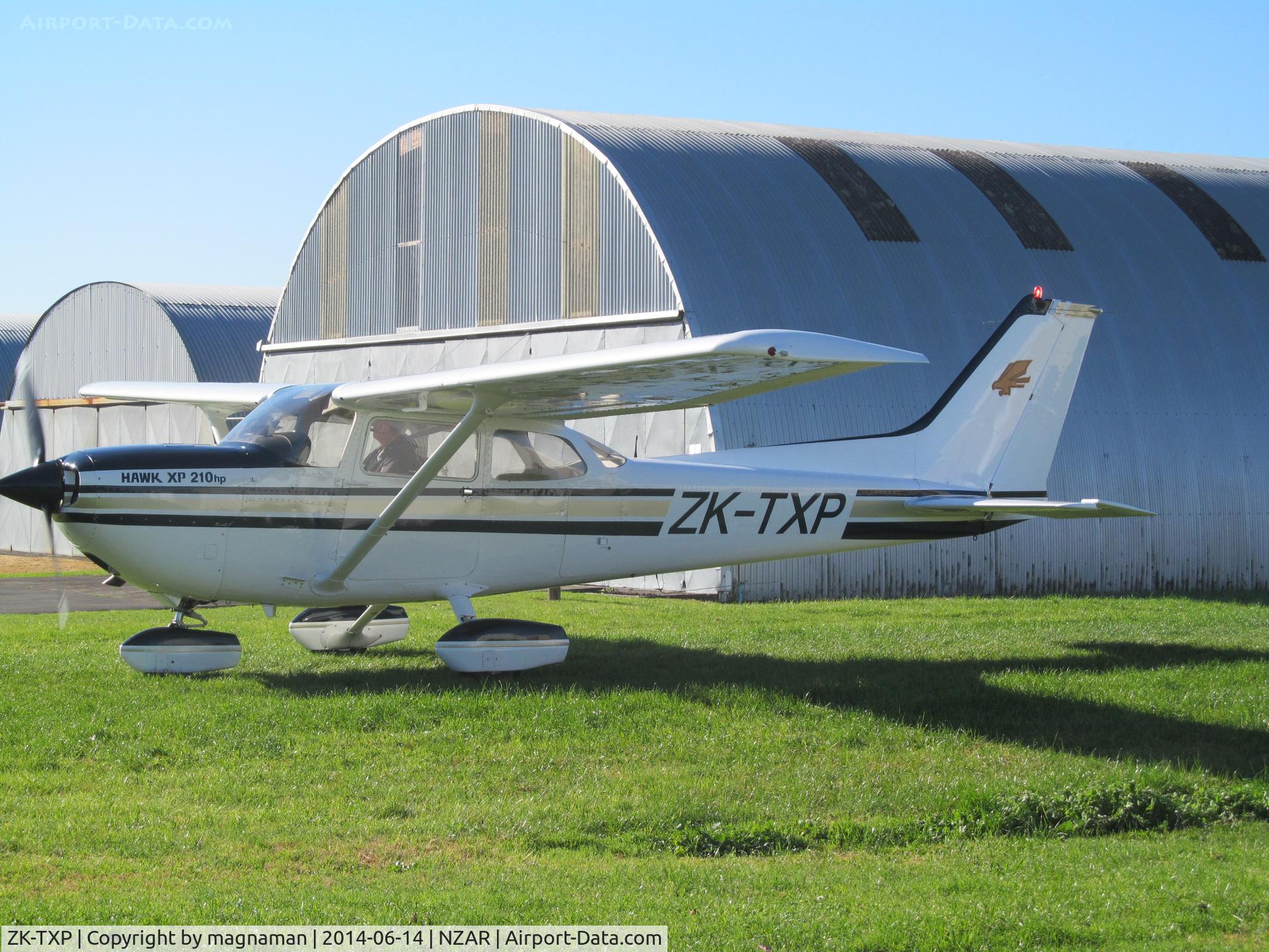 ZK-TXP, Cessna R172K Hawk XP C/N R172-2901, Taxying out from private hangars at Ardmore