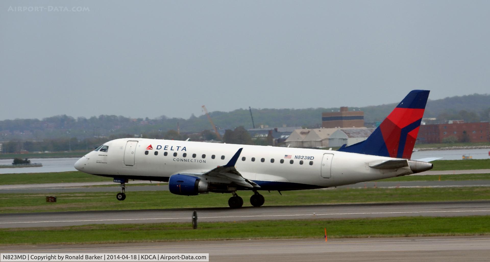 N823MD, 2005 Embraer 170SU (ERJ-170-100SU) C/N 17000044, Nose wheel liftoff Reagan