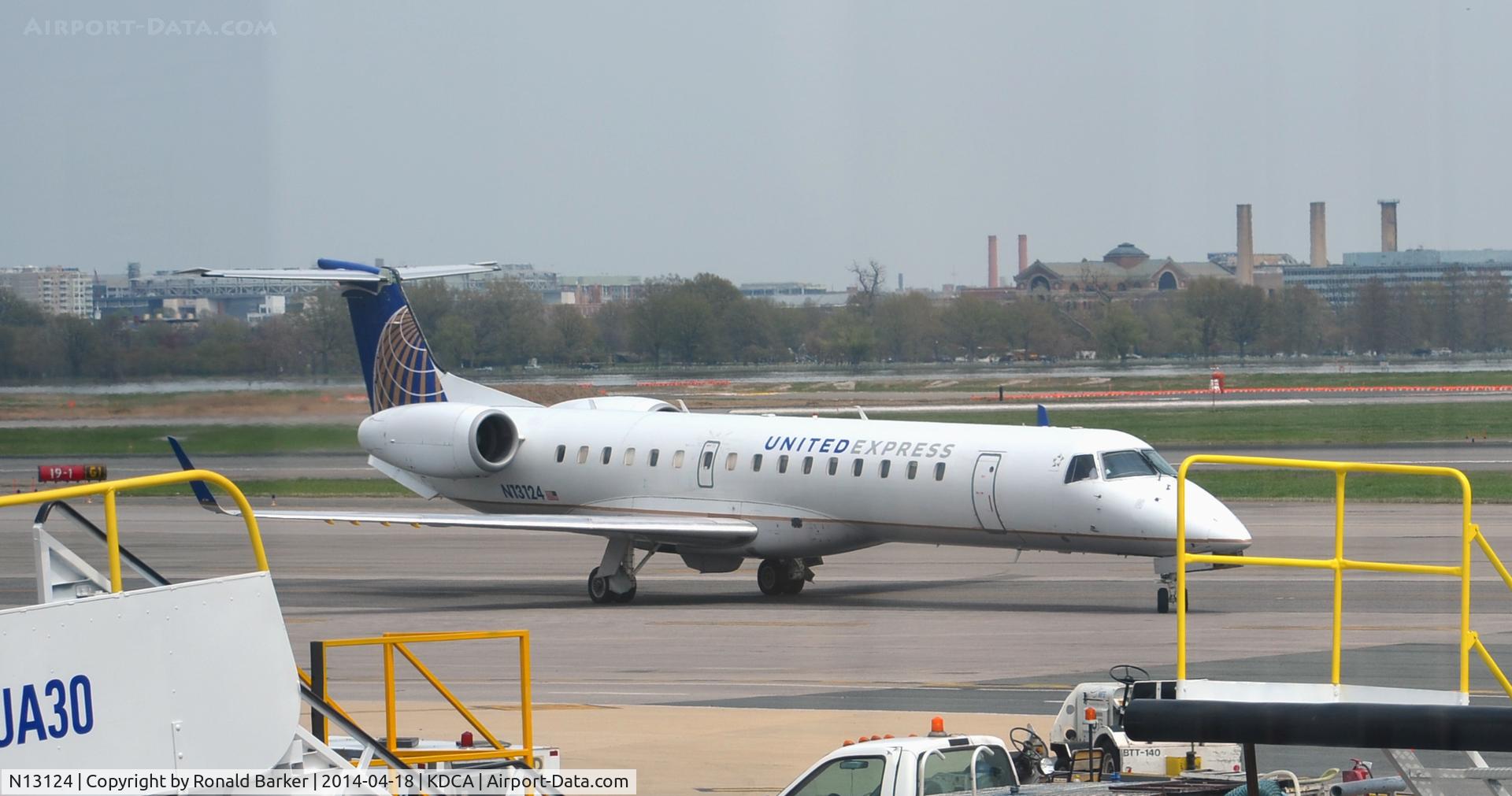 N13124, 2003 Embraer ERJ-145XR (EMB-145XR) C/N 145689, Taxi to park Reagan