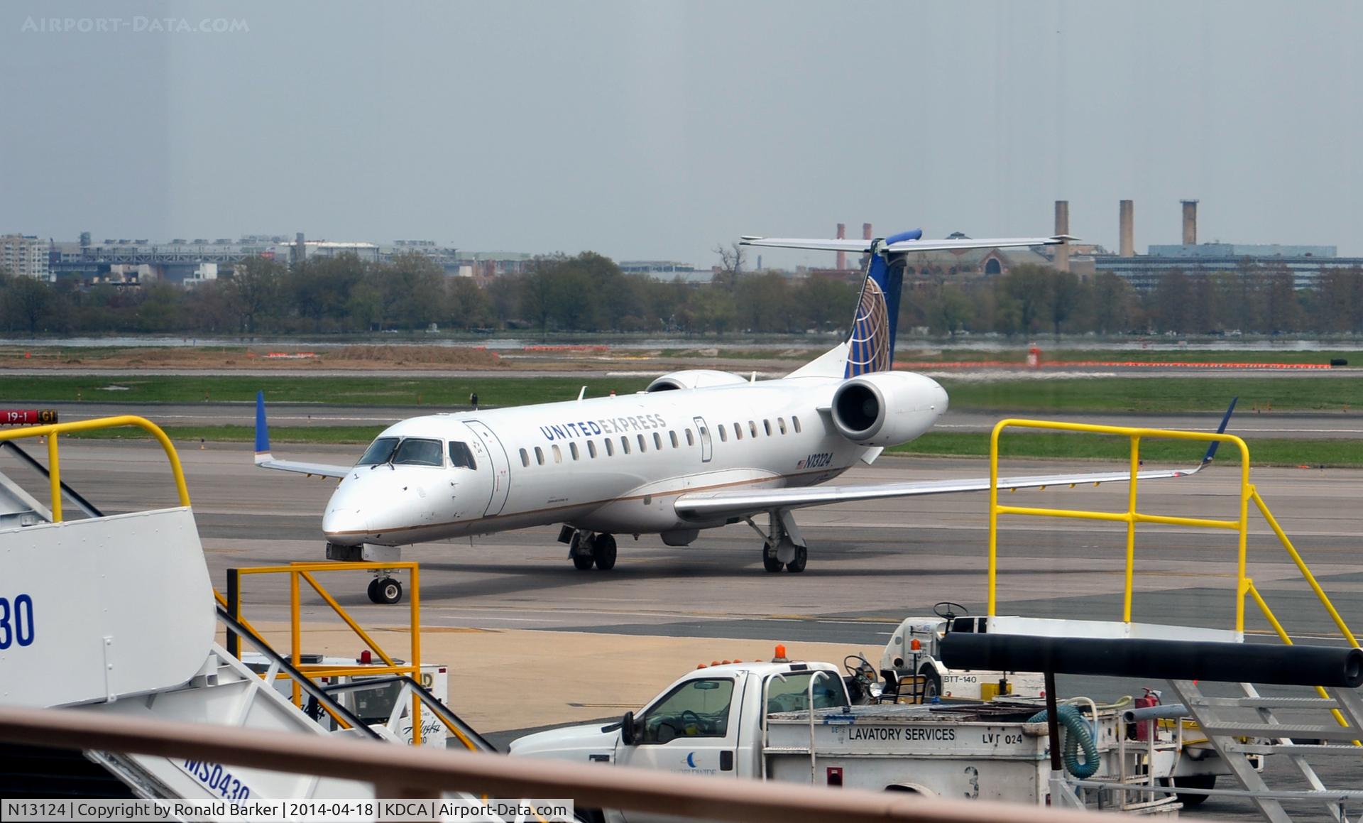 N13124, 2003 Embraer ERJ-145XR (EMB-145XR) C/N 145689, Taxi to park Reagan