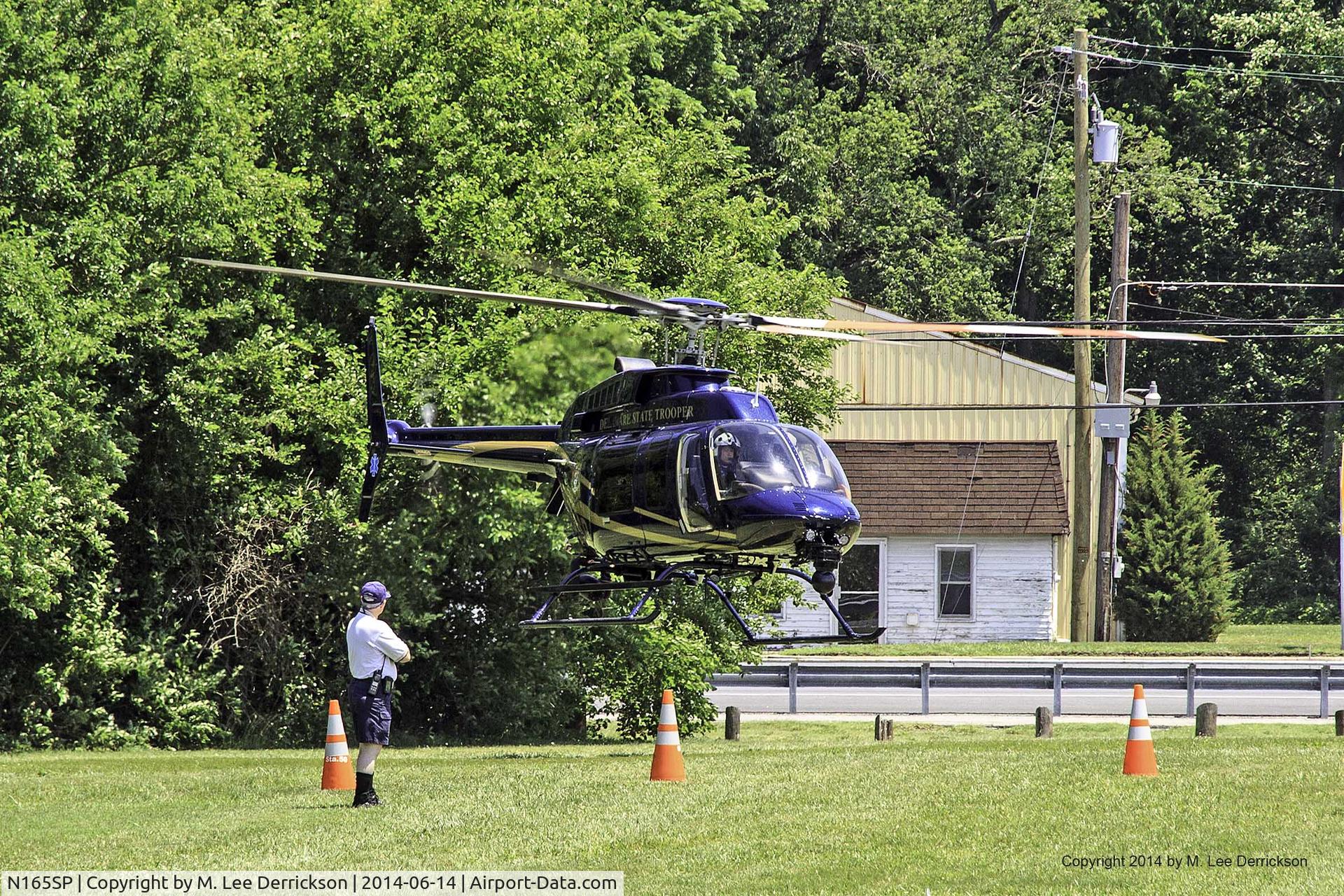 N165SP, 2000 Bell 407 C/N 53458, State Police helicopter leaving Brecknock Park, Camden, Delaware, after Safe Summer Day activities.