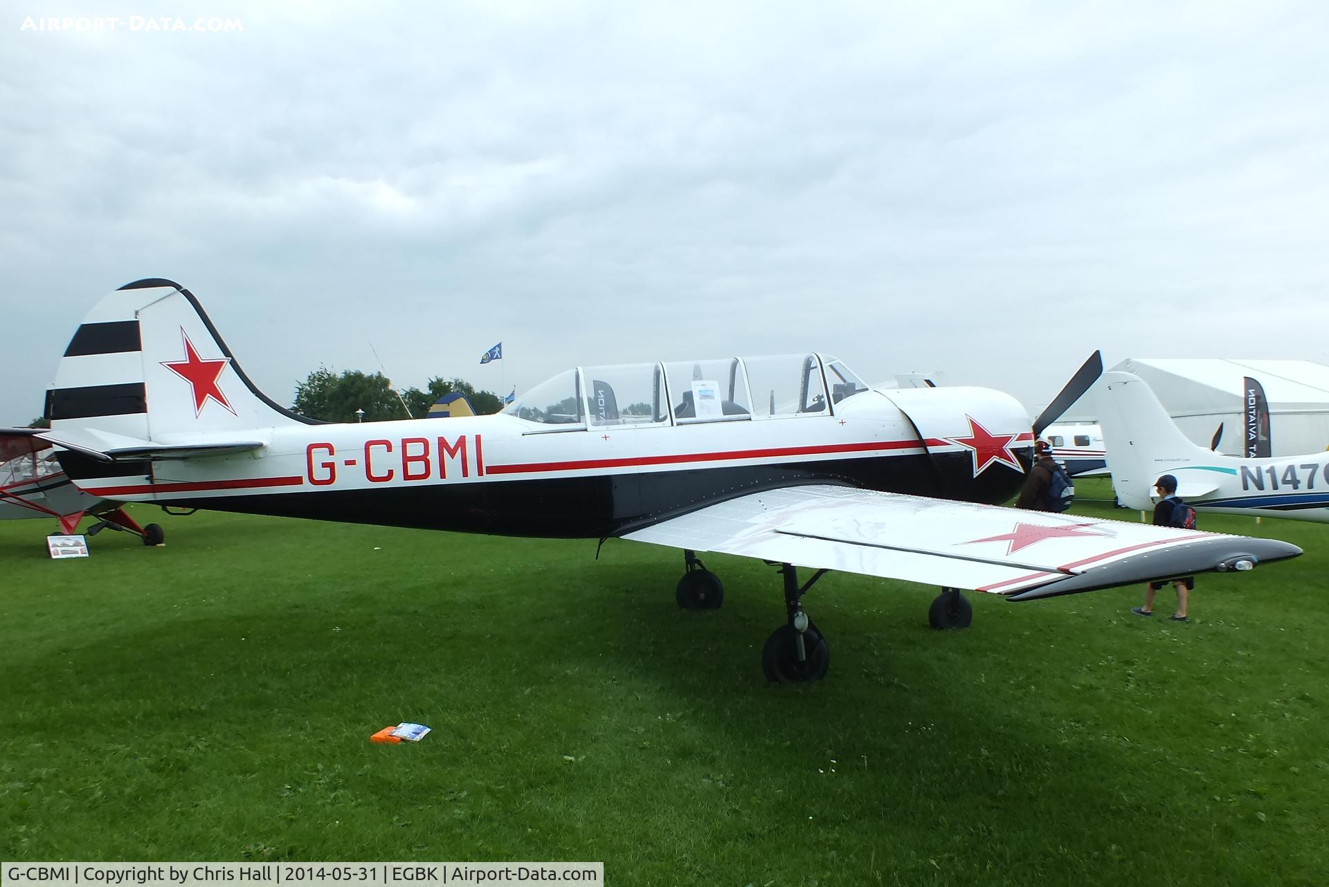 G-CBMI, 1985 Bacau Yak-52 C/N 855907, at AeroExpo 2014