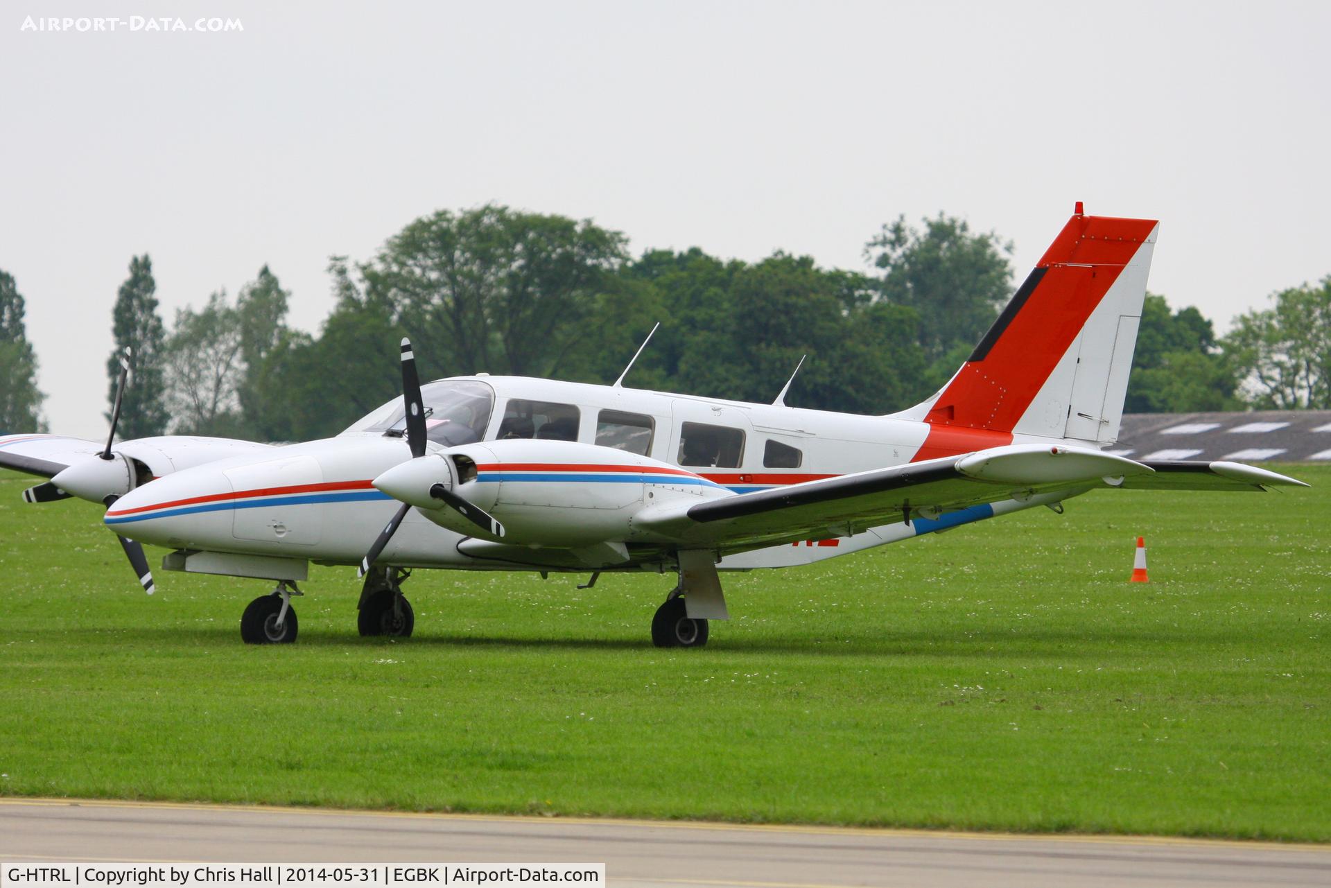G-HTRL, 1983 Piper PA-34-220T Seneca III C/N 34-8333061, at AeroExpo 2014