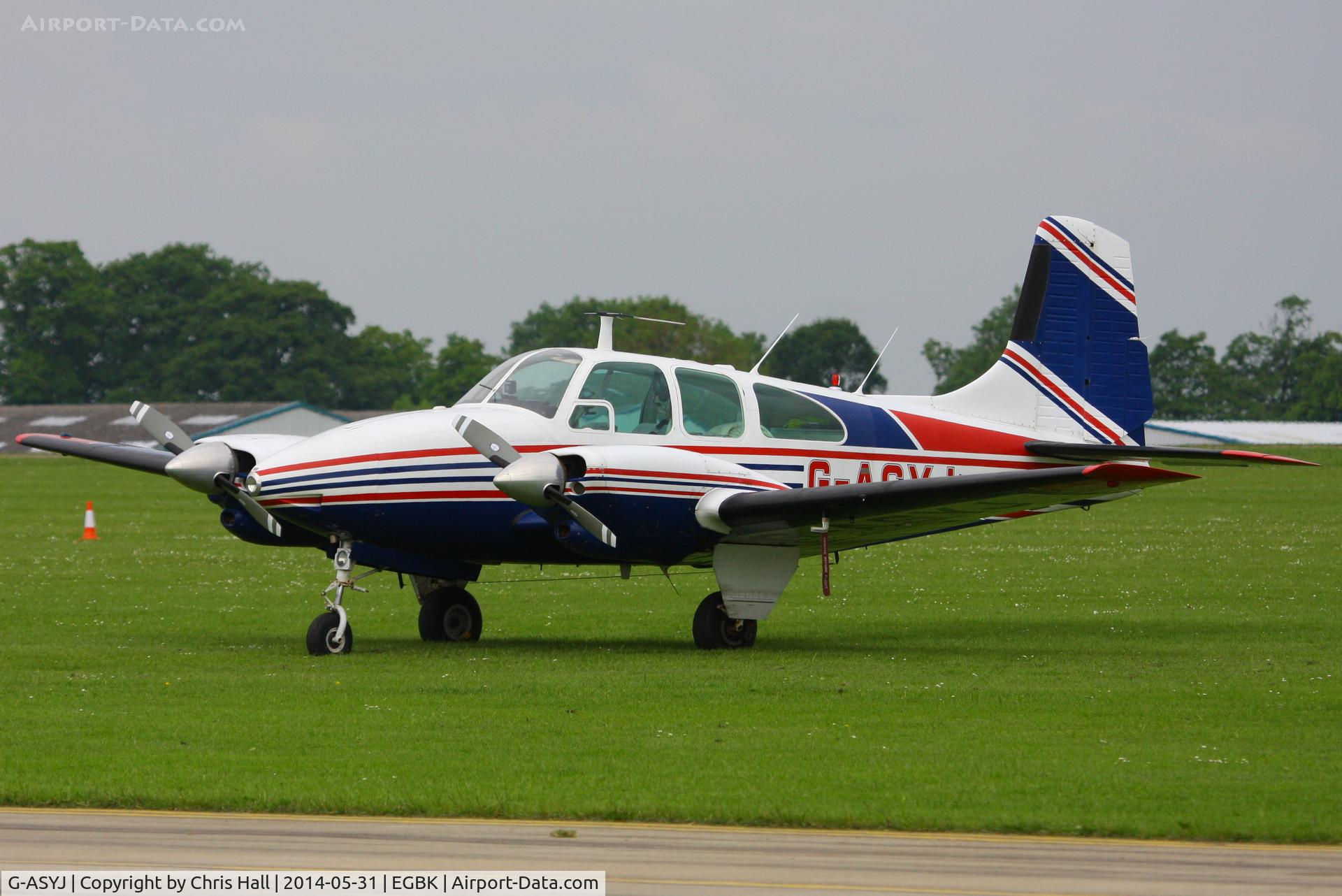 G-ASYJ, 1964 Beech D95A Travel Air C/N TD-595, at AeroExpo 2014
