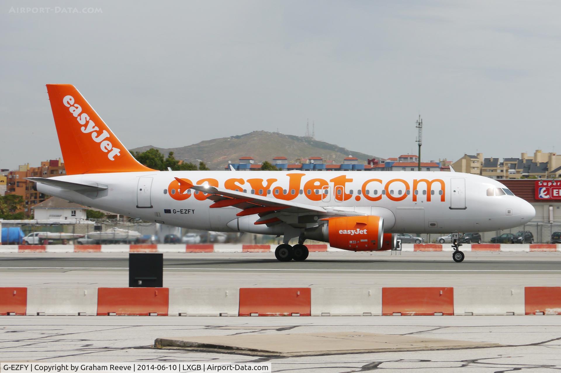 G-EZFY, 2010 Airbus A319-111 C/N 4418, About to take off.