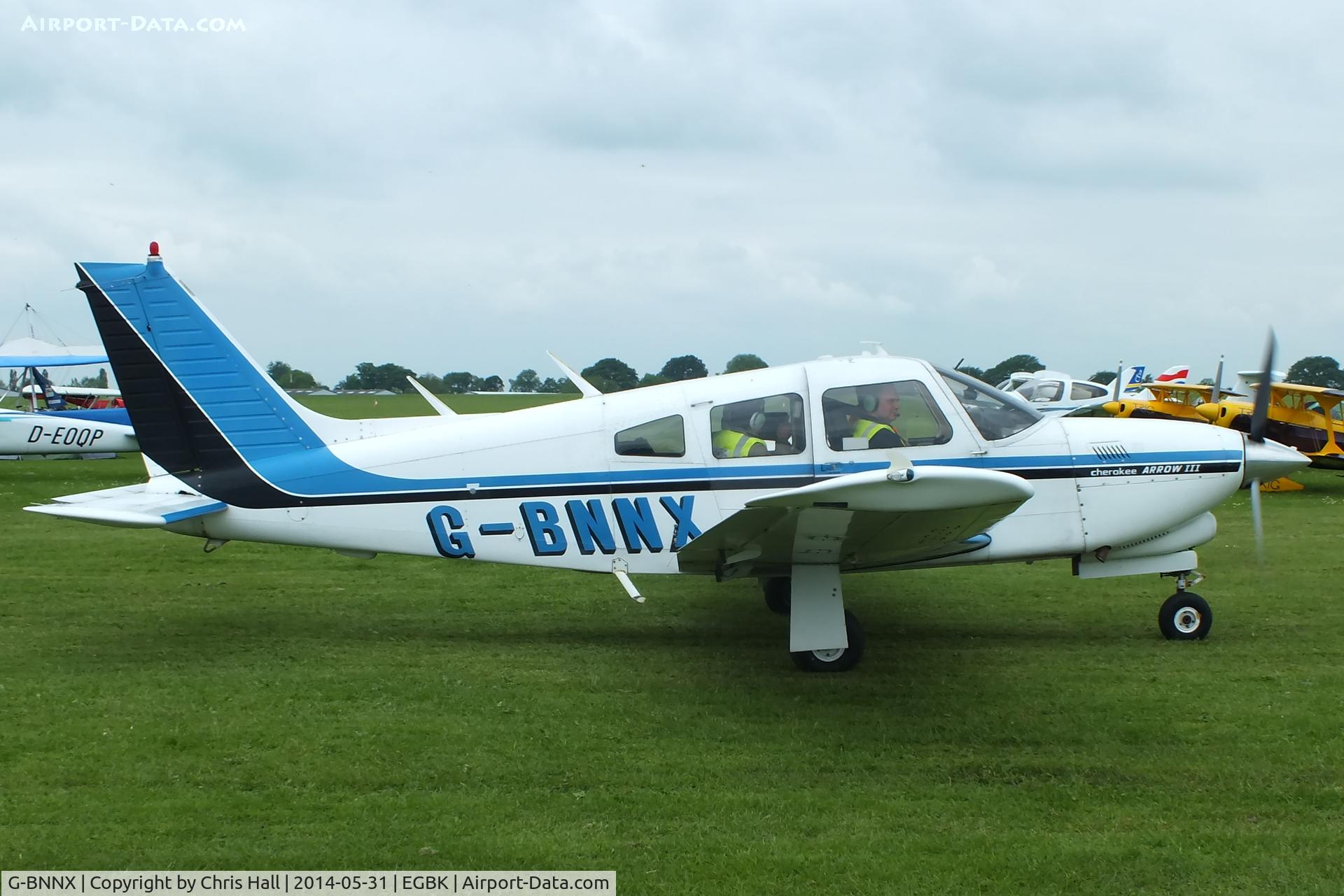 G-BNNX, 1977 Piper PA-28R-201T Cherokee Arrow III C/N 28R-7703009, at AeroExpo 2014