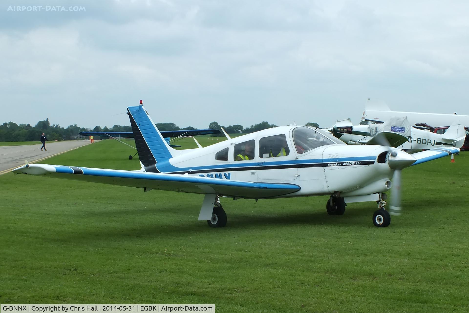 G-BNNX, 1977 Piper PA-28R-201T Cherokee Arrow III C/N 28R-7703009, at AeroExpo 2014
