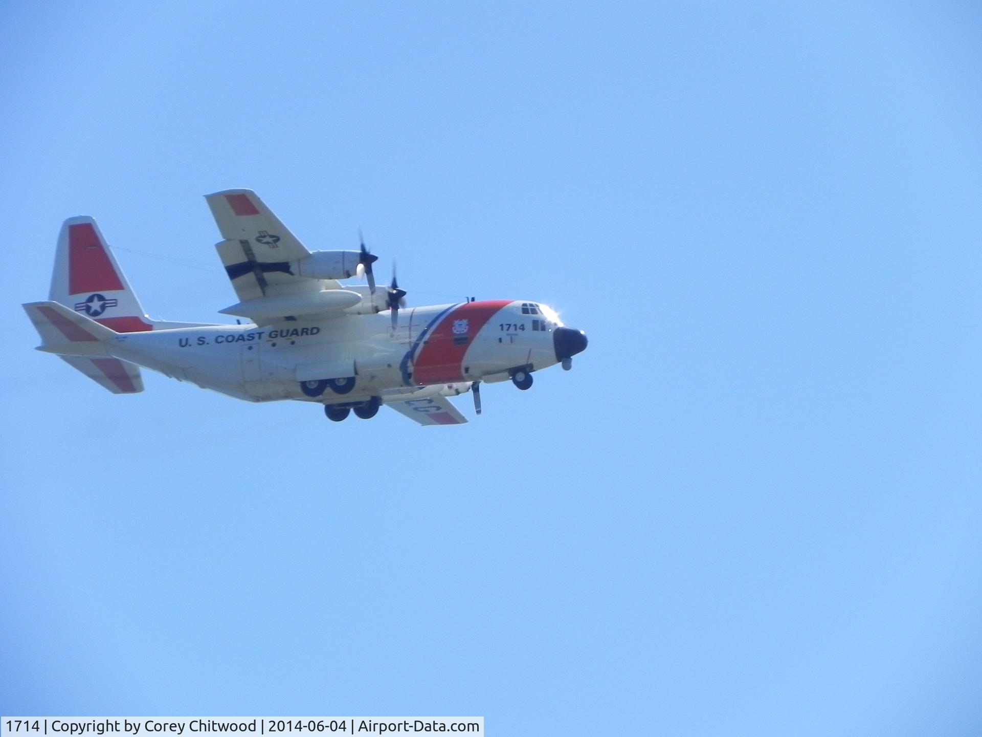 1714, 1985 Lockheed HC-130H7 Hercules C/N 382-5035, Flying on a clear day near Coast Guard Air Station Kodiak.