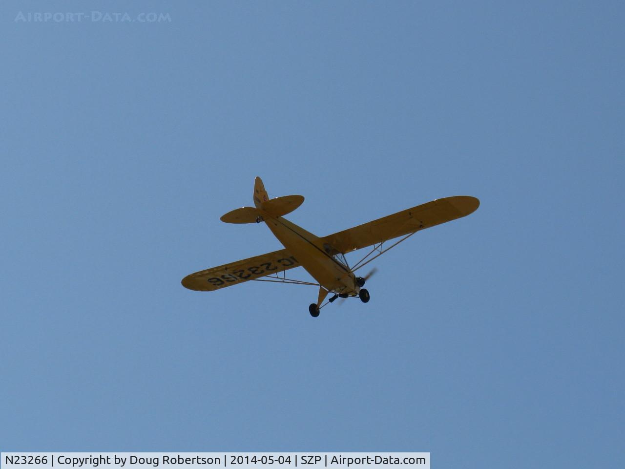 N23266, 1939 Piper J3C-65 Cub Cub C/N 3113, 1939 Piper J3C-65 CUB, Continental A&C65 65 Hp, takeoff climb Rwy 22, a 75 year old airplane not quite as old as the old photographer