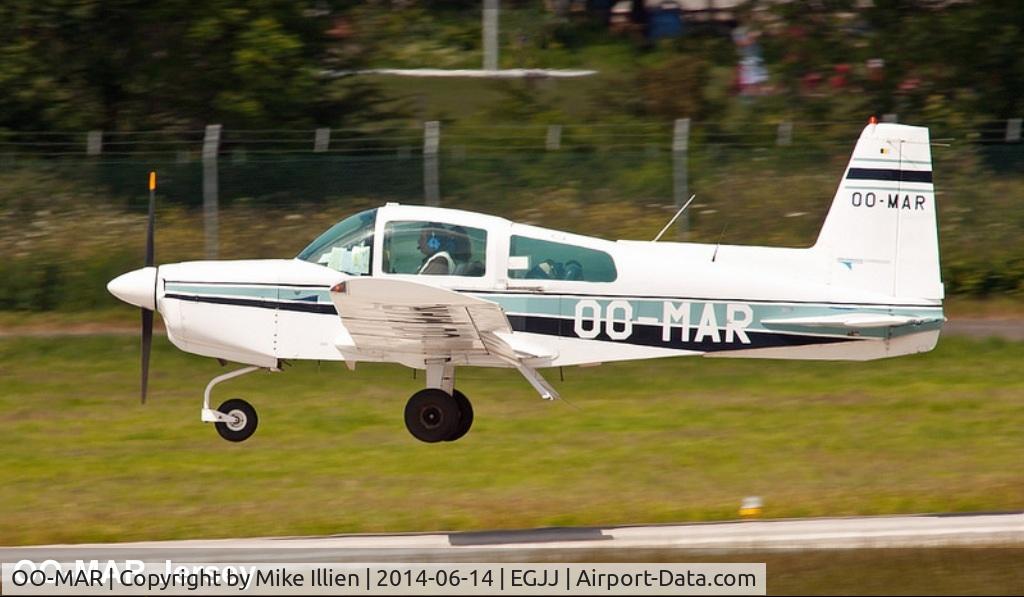 OO-MAR, 1973 Grumman American AA-5 Traveler C/N AA5-0424, On very short final about to touch down ..landing runway 27 at  Jersey International Airport ( Channel Islands UK ) on Wednesday, June 14th .