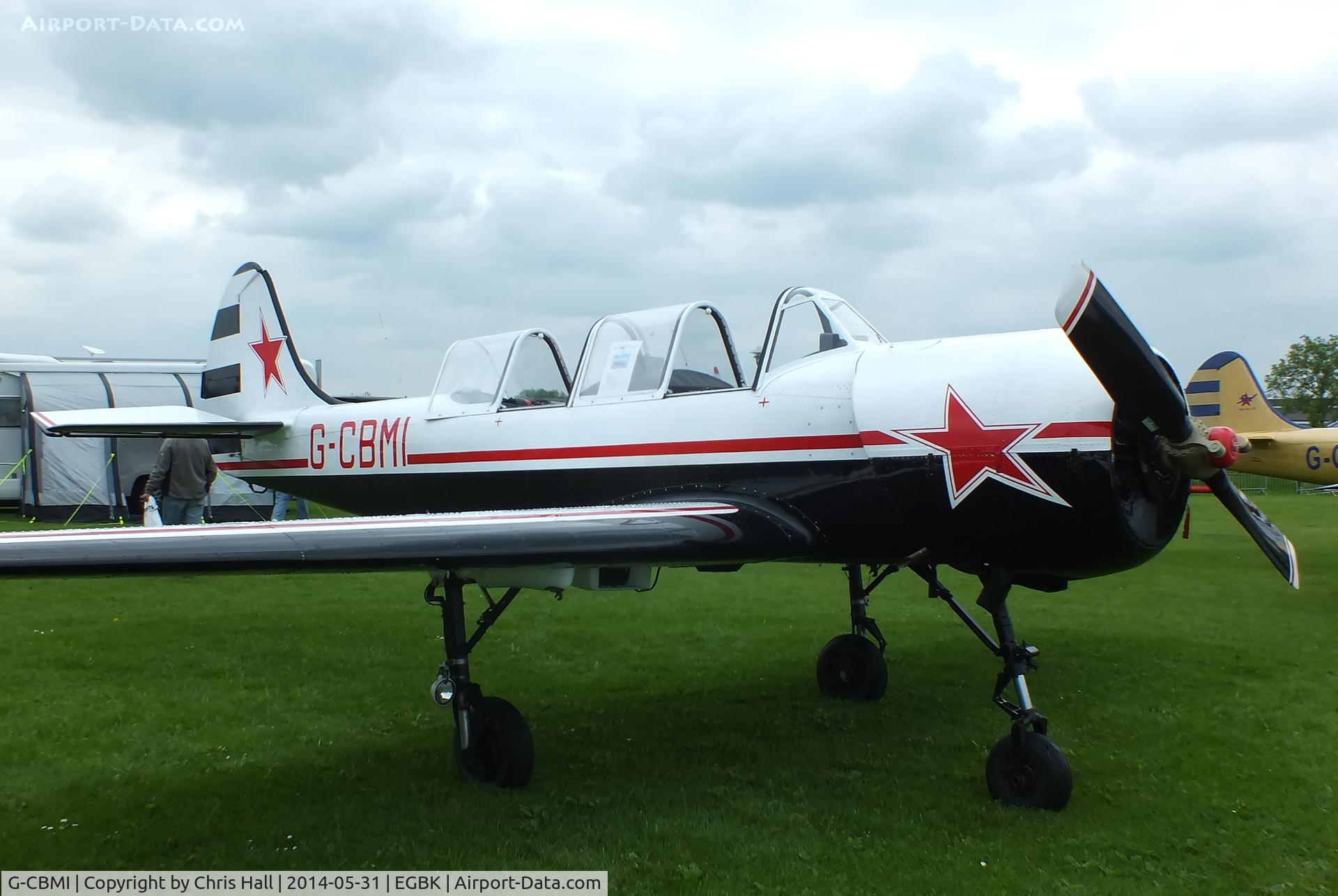 G-CBMI, 1985 Bacau Yak-52 C/N 855907, at AeroExpo 2014