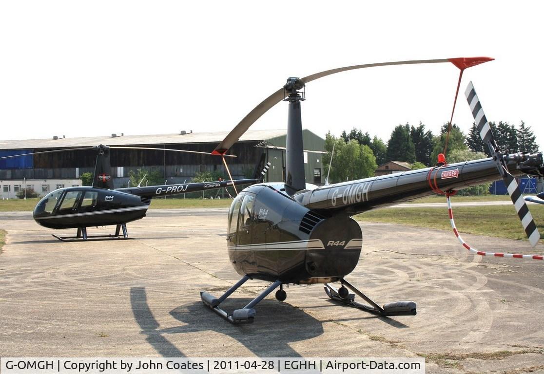 G-OMGH, 2004 Robinson R44 Clipper II C/N 10259, With G-PROJ at Bth Helis