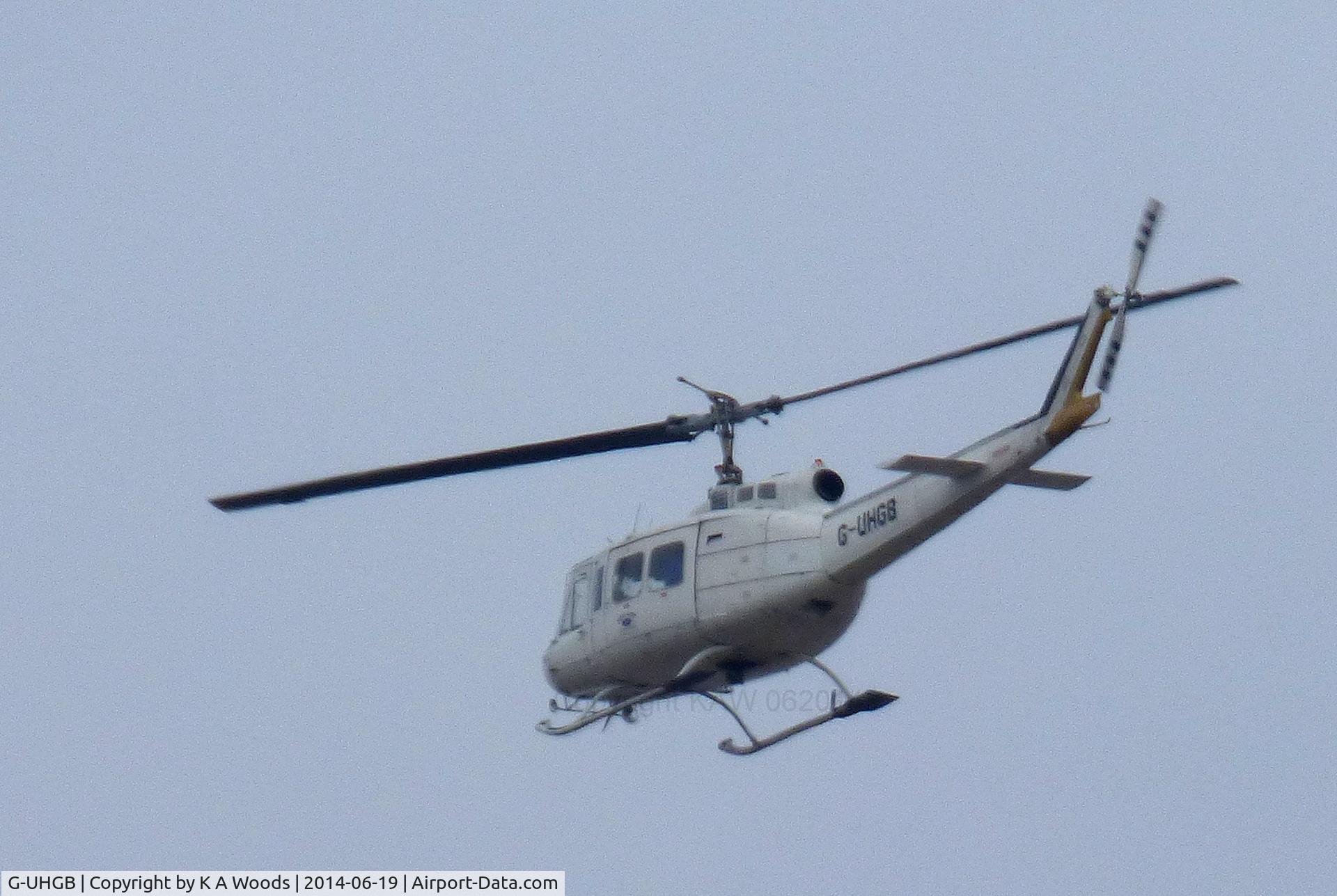 G-UHGB, 1979 Bell 205A-1 C/N 30291, Flying West crossing Wallasey Thursday 19th June 2014