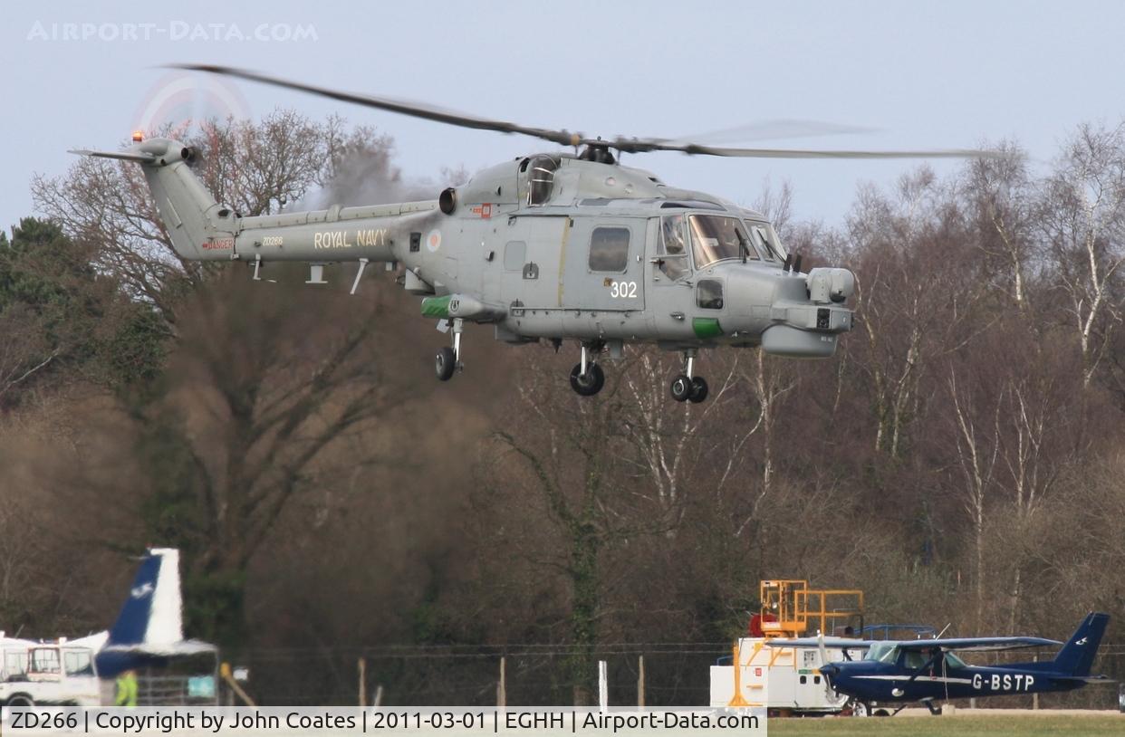 ZD266, 1983 Westland Lynx HMA.8 C/N 305, Departing Cobham