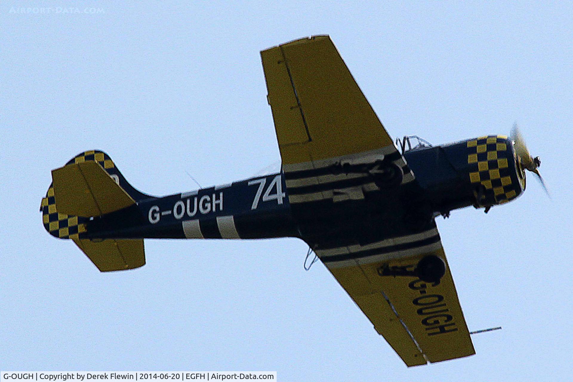 G-OUGH, 1987 Bacau Yak-52 C/N 877404, Resident YAK-52, in the overhead at EGFH after a local flight.