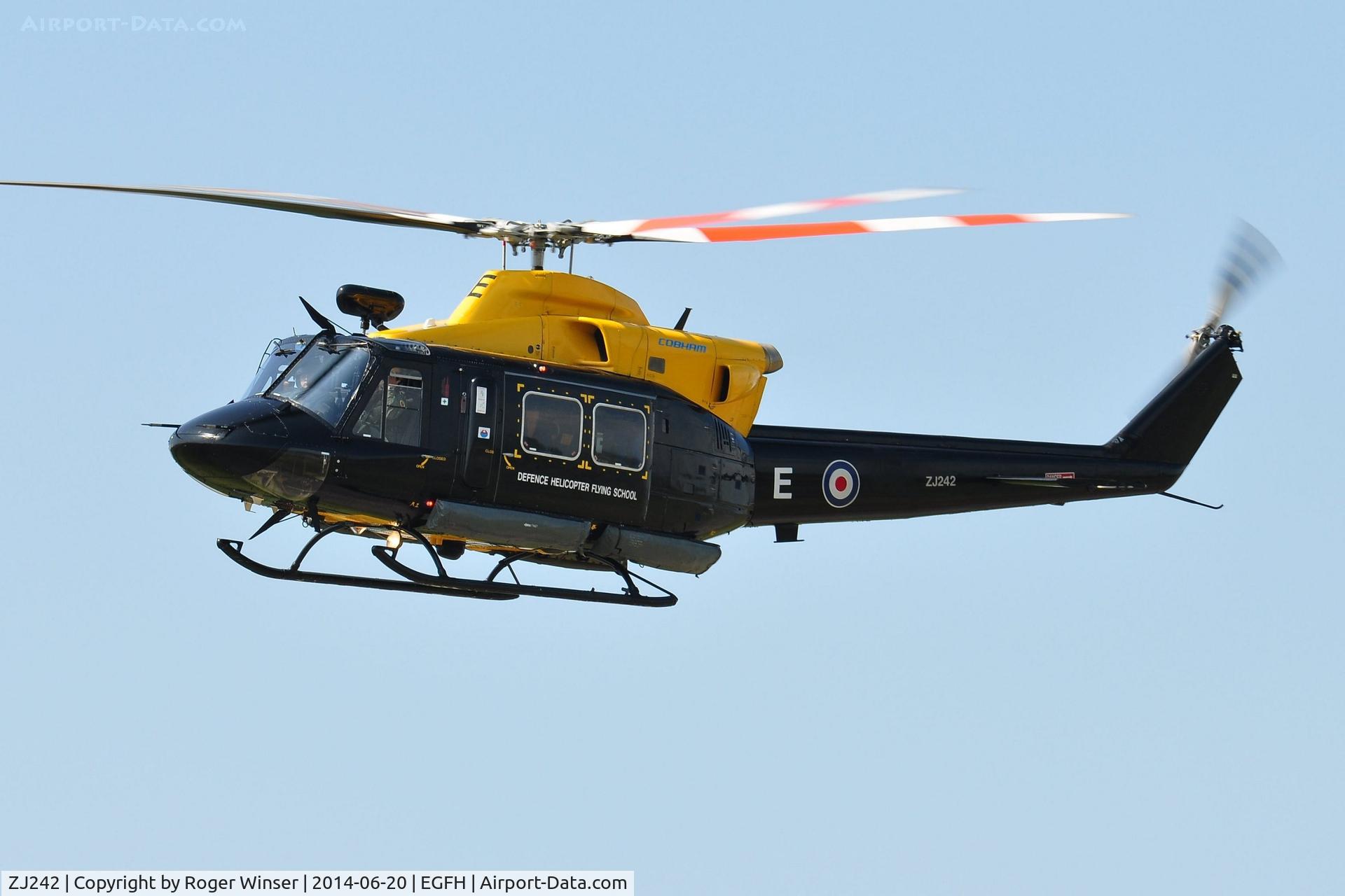 ZJ242, 1994 Bell 412EP Griffin HT1 C/N 36095, Griffin helicopter coded E of 60(R) Squadron RAF fast and low flyby. Previously registered G-BXDK and N2291Q.
