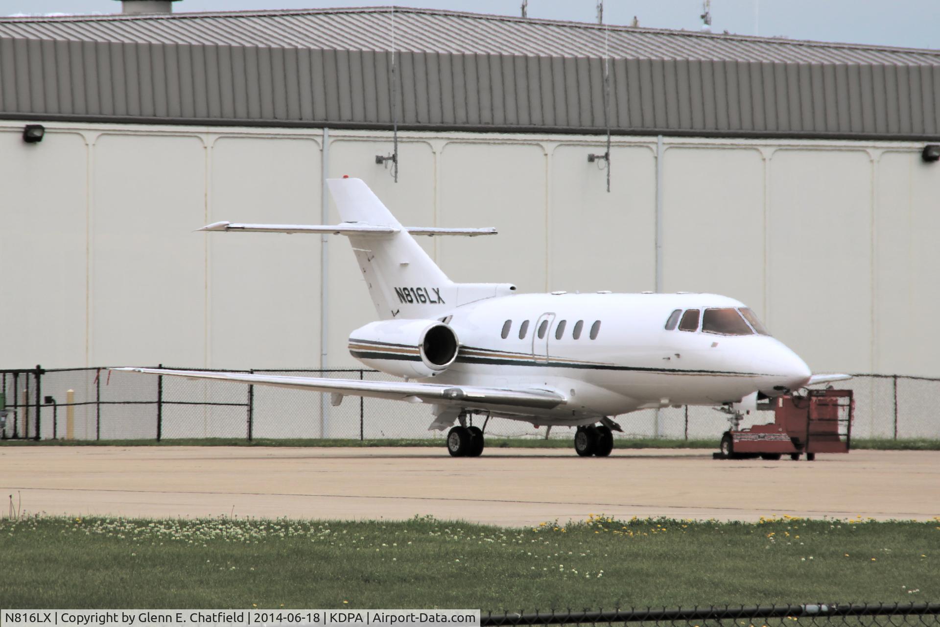 N816LX, 1998 Raytheon Hawker 800XP C/N 258363, Had to stand on my bumper to get the shot