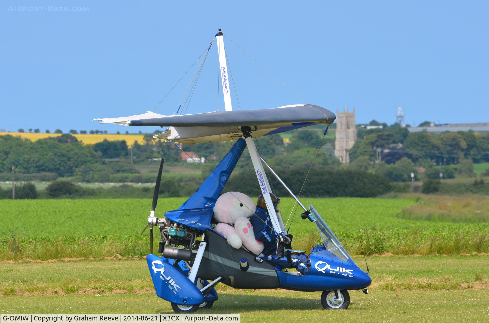 G-OMIW, 2007 P&M Aviation Pegasus Quik C/N 8232, With bunny in the back at Crabfield 2014.