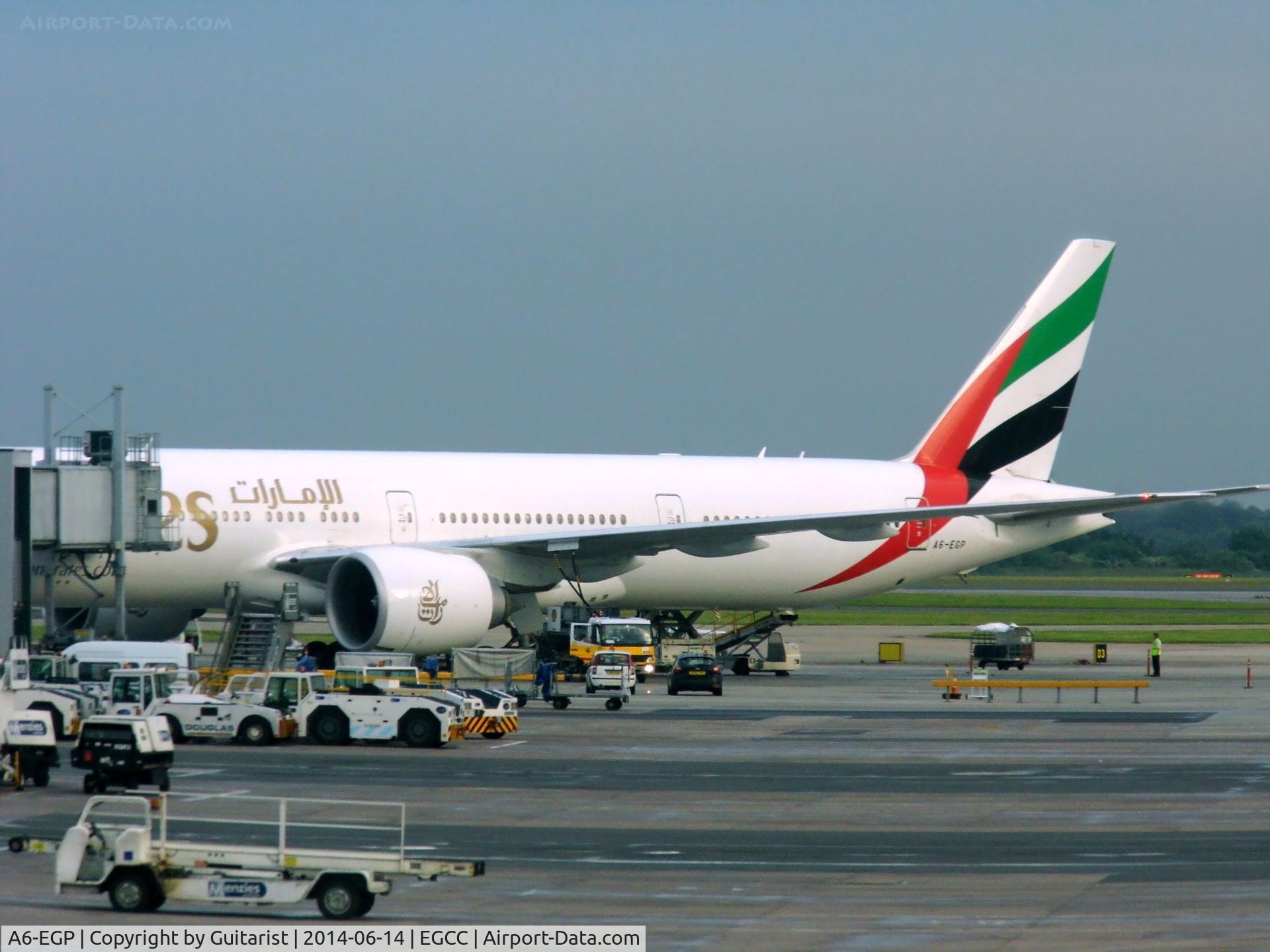 A6-EGP, 2012 Boeing 777-31H/ER C/N 35599, From the departure lounge in terminal 1 at Manchester