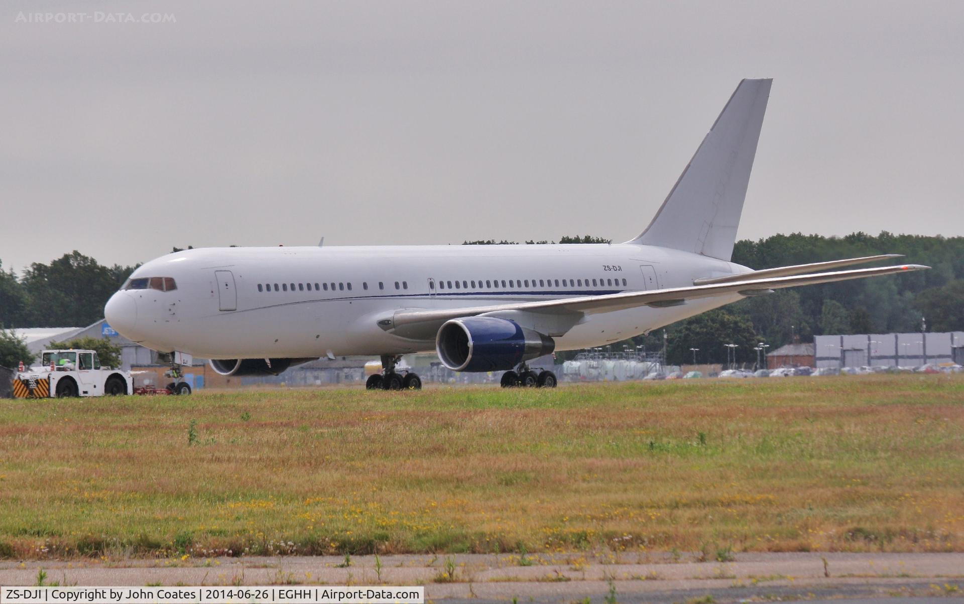ZS-DJI, 1986 Boeing 767-216 C/N 23624, Being towed to parking