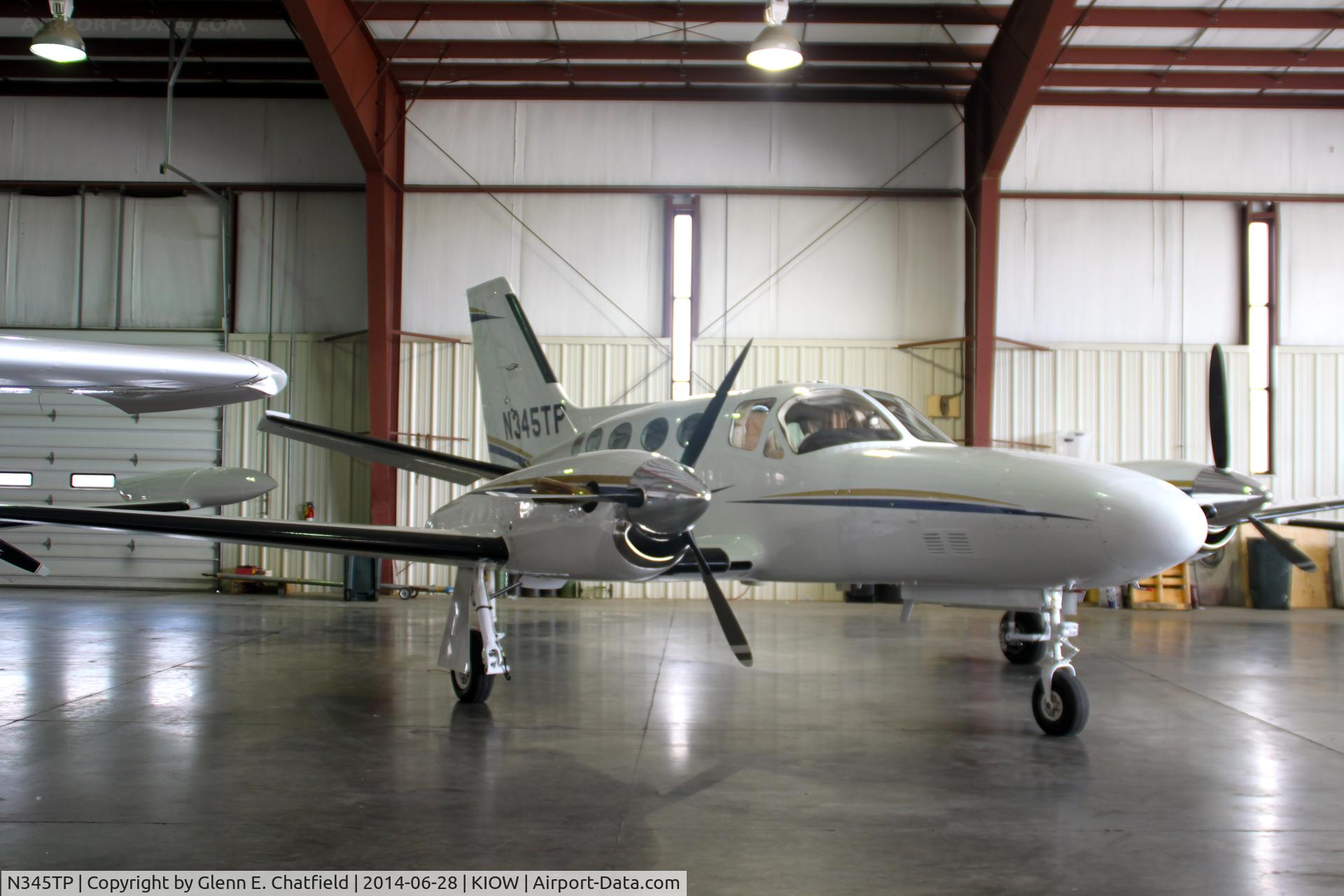 N345TP, Cessna 425 Corsair C/N 425-0005, Among aircraft displayed in a hangar during the air show